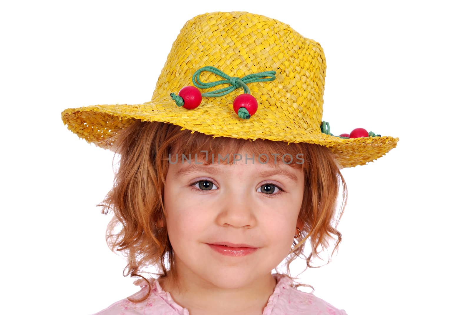 Beauty little girl with yellow straw hat