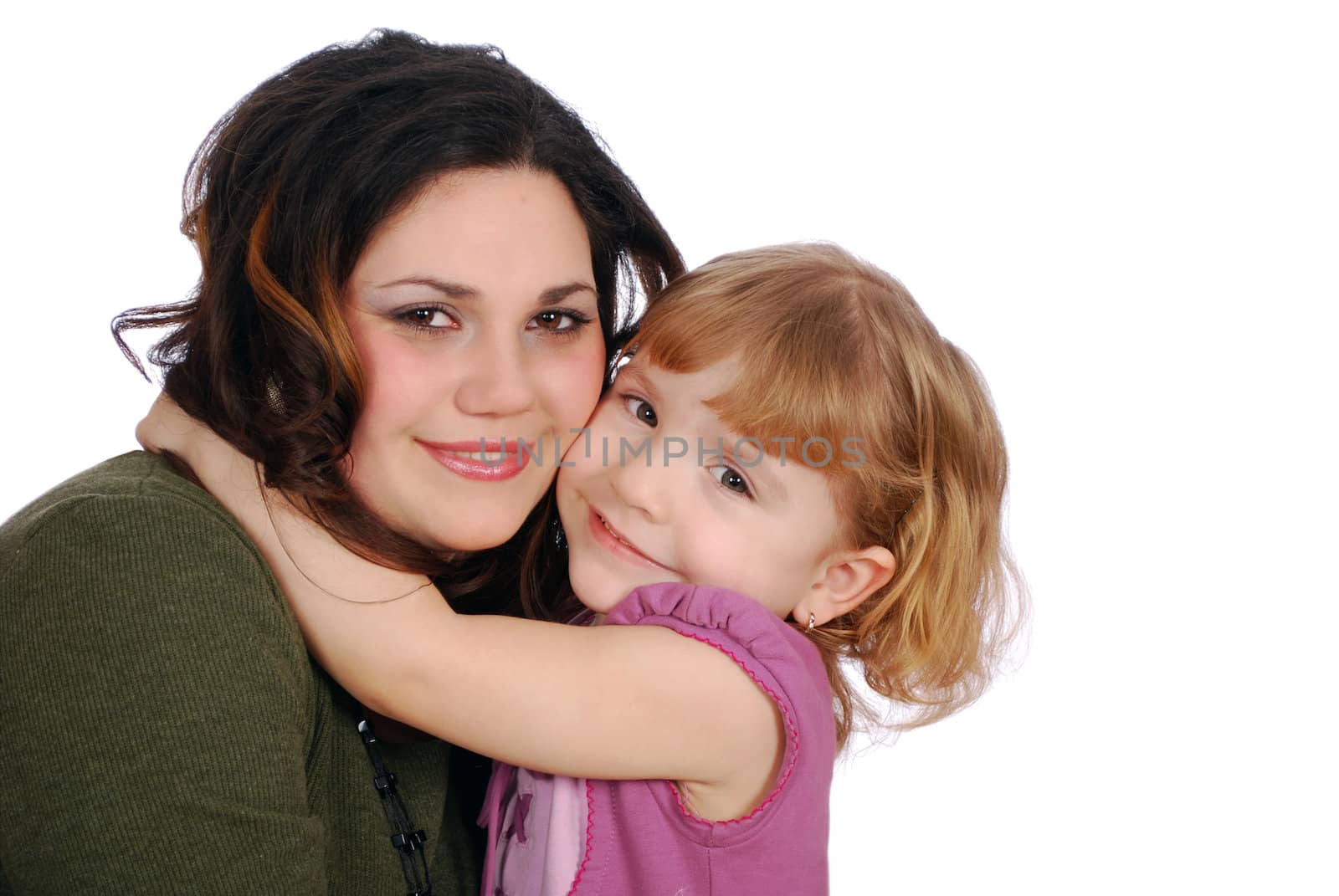 Girl and child big hug studio shot