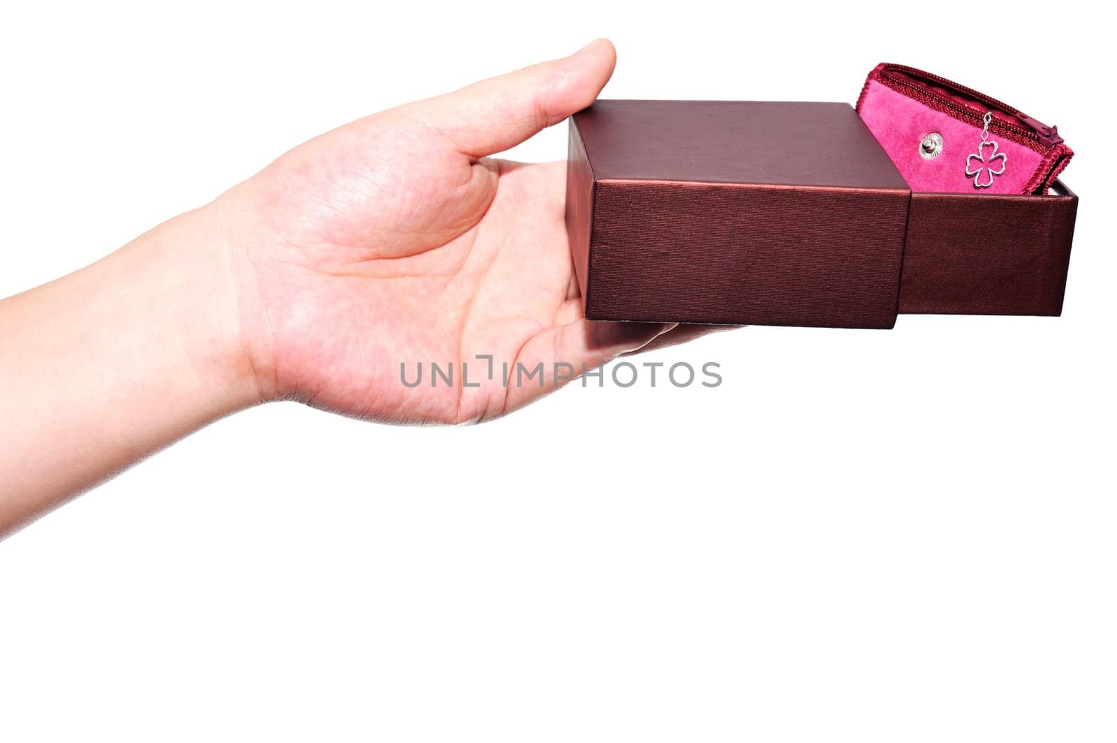 Holding a gift box with a necklace in it