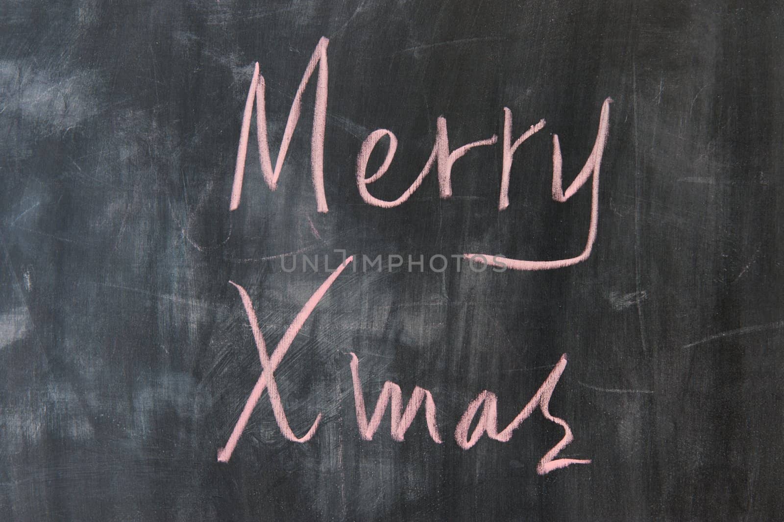 Chalkboard writing - concept of Merry Christmas