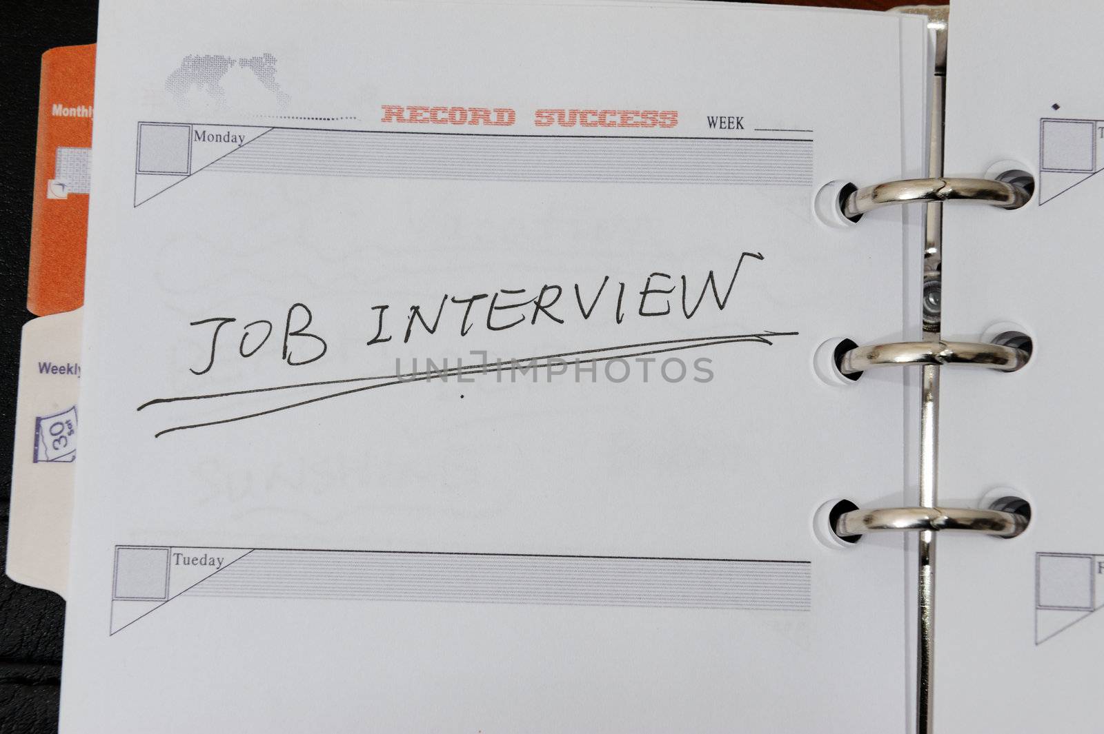 Job interview words written on notebook