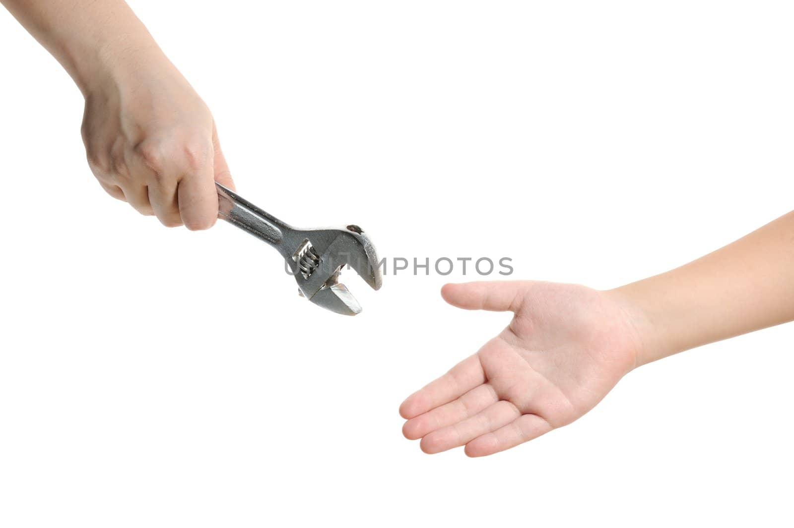 Two hands handing over wrench isolated on white background