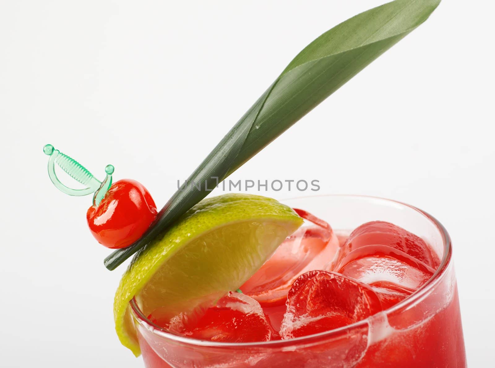 fruit cocktail  closeup isolated on white background.