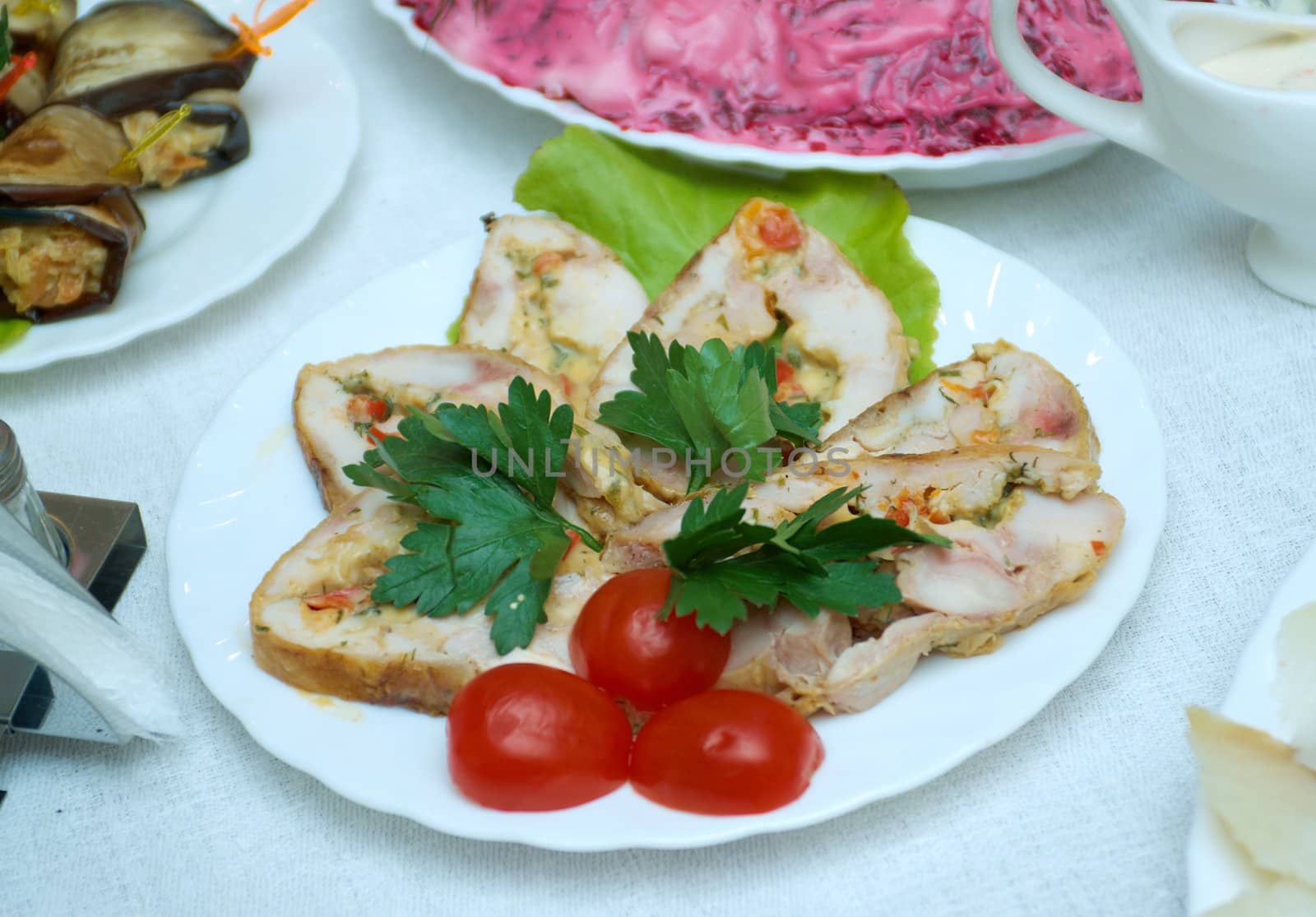 Toasted fried meat roll and it's slices on plate 