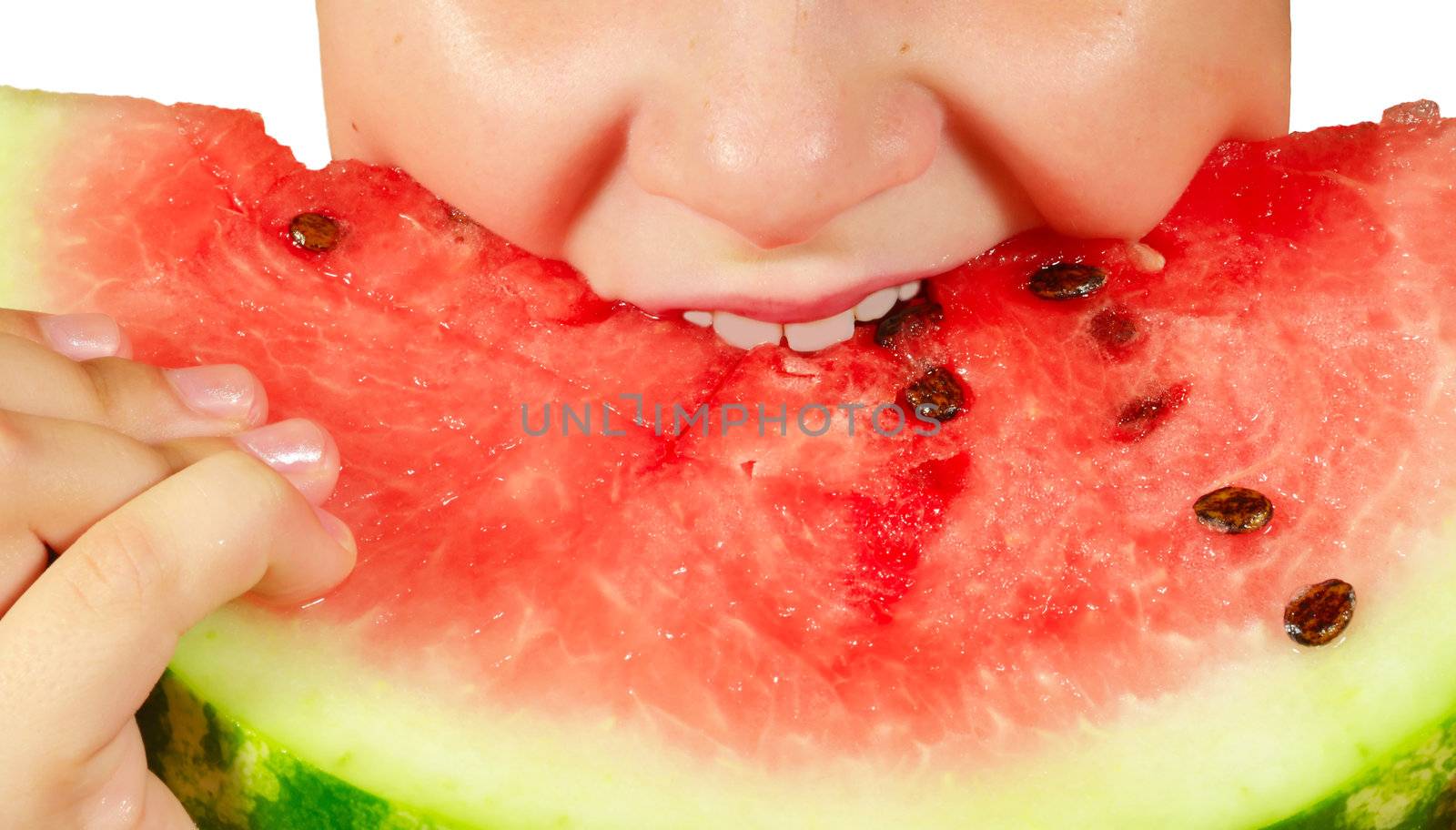 The child eat a ripe juicy red watermelon