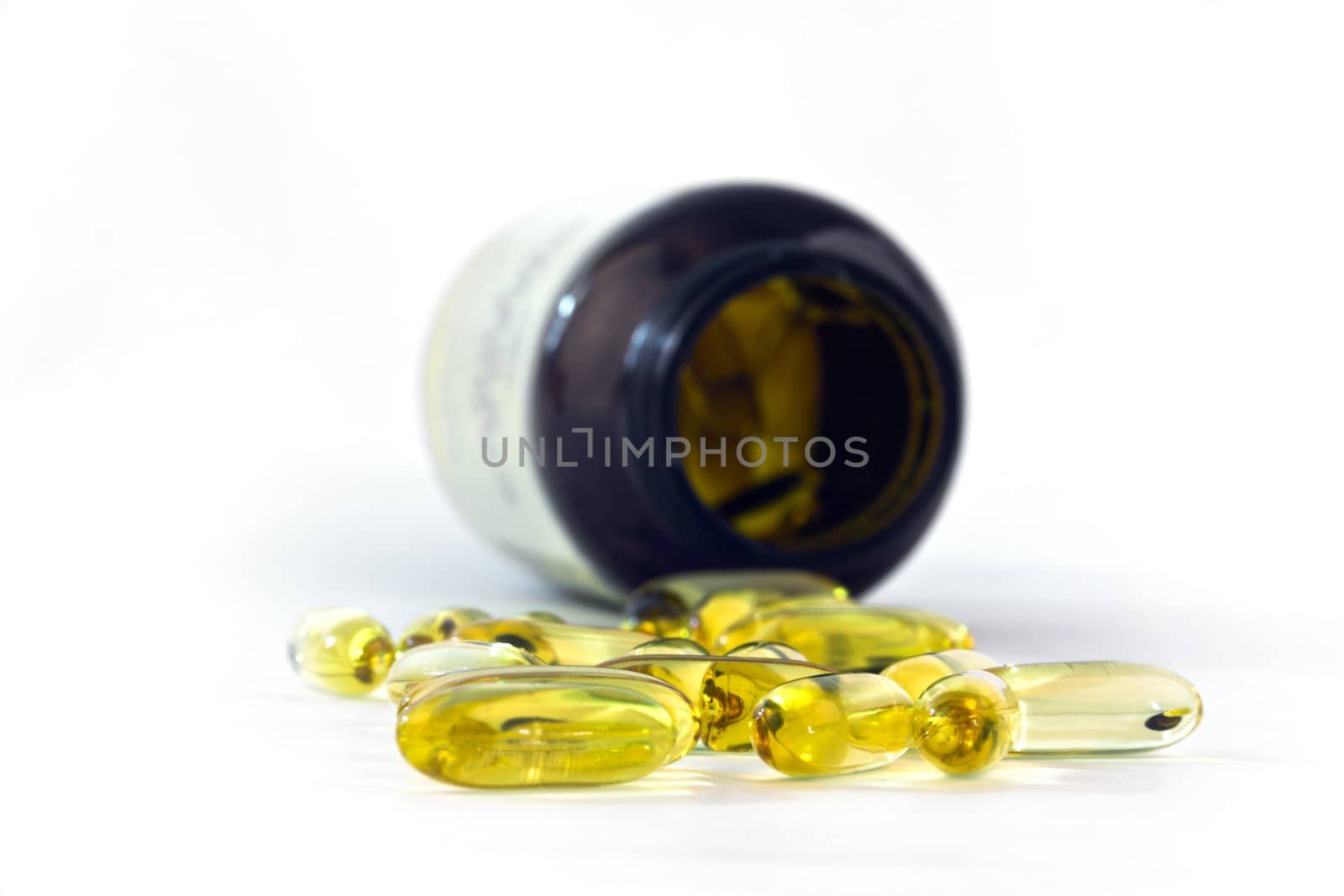 Yellow Fish Oils Isolated on White Background