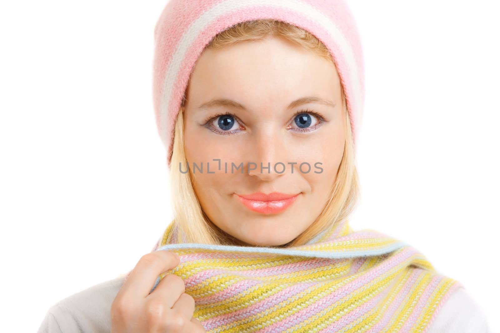 smiling girl in cap and scarf