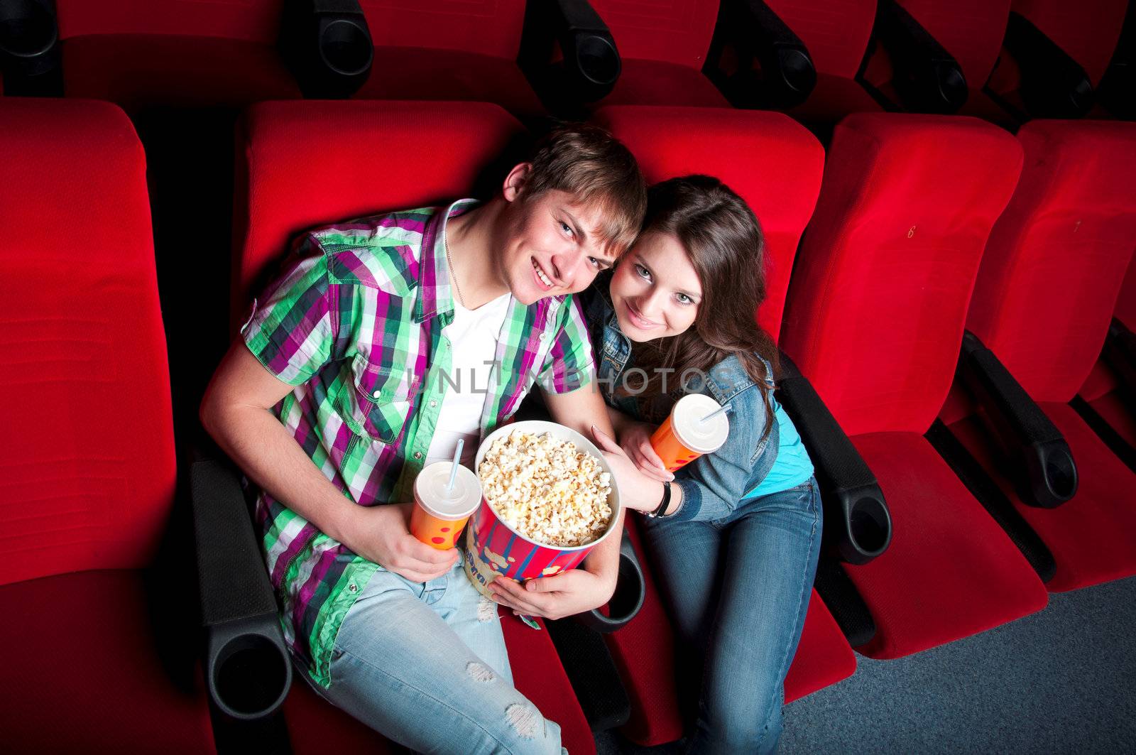 couple in a movie theater, watching a 3D movie