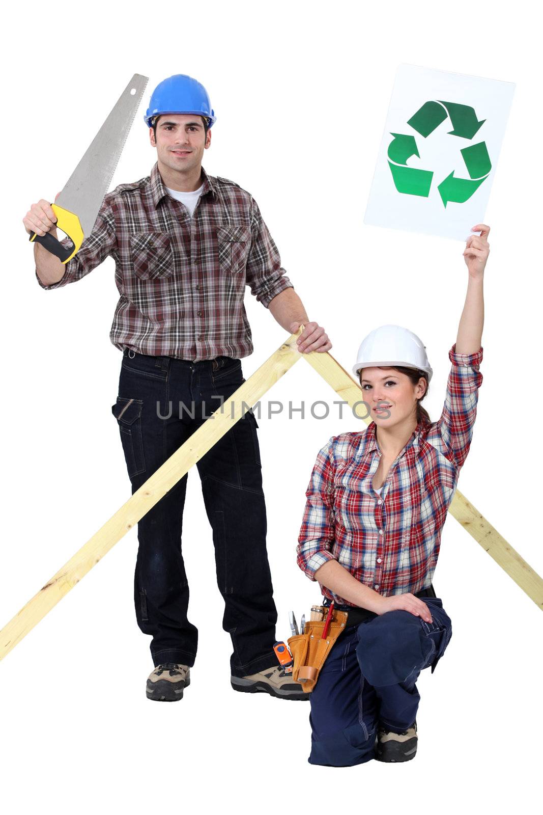 Builders with a recycle sign