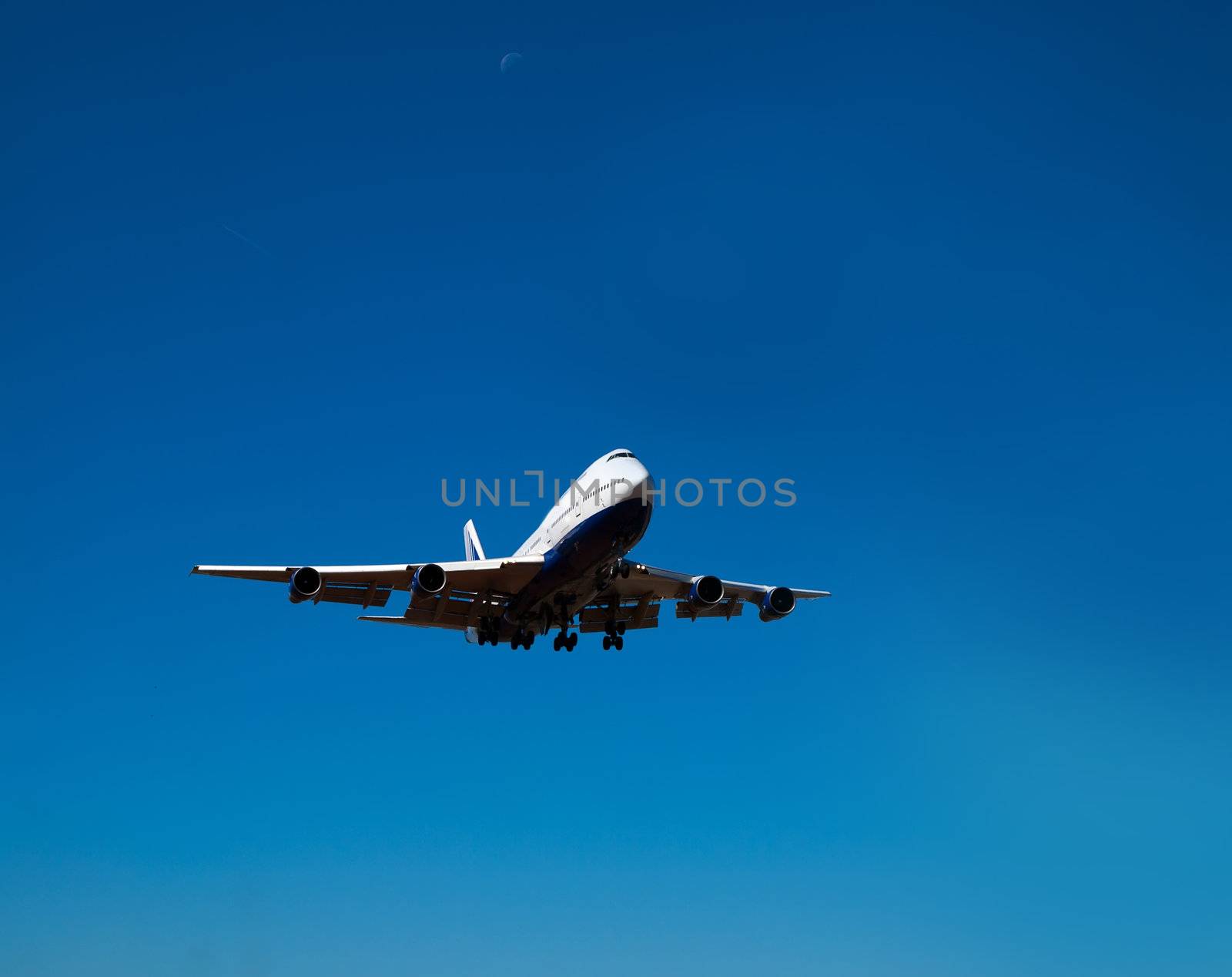 white nose of heavy jet in landing position   