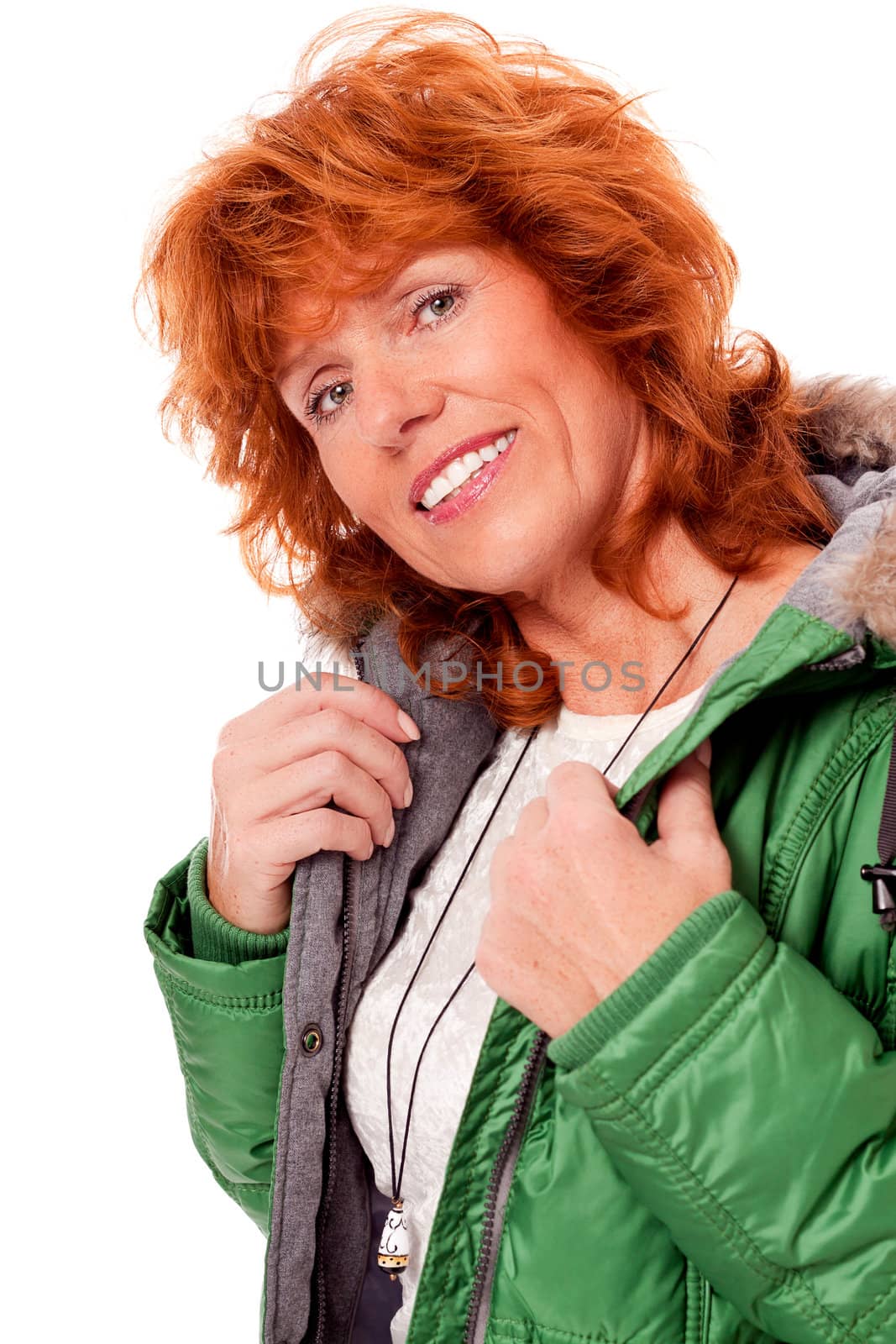 adult redhead woman with winter jacket smiling isolated on white background
