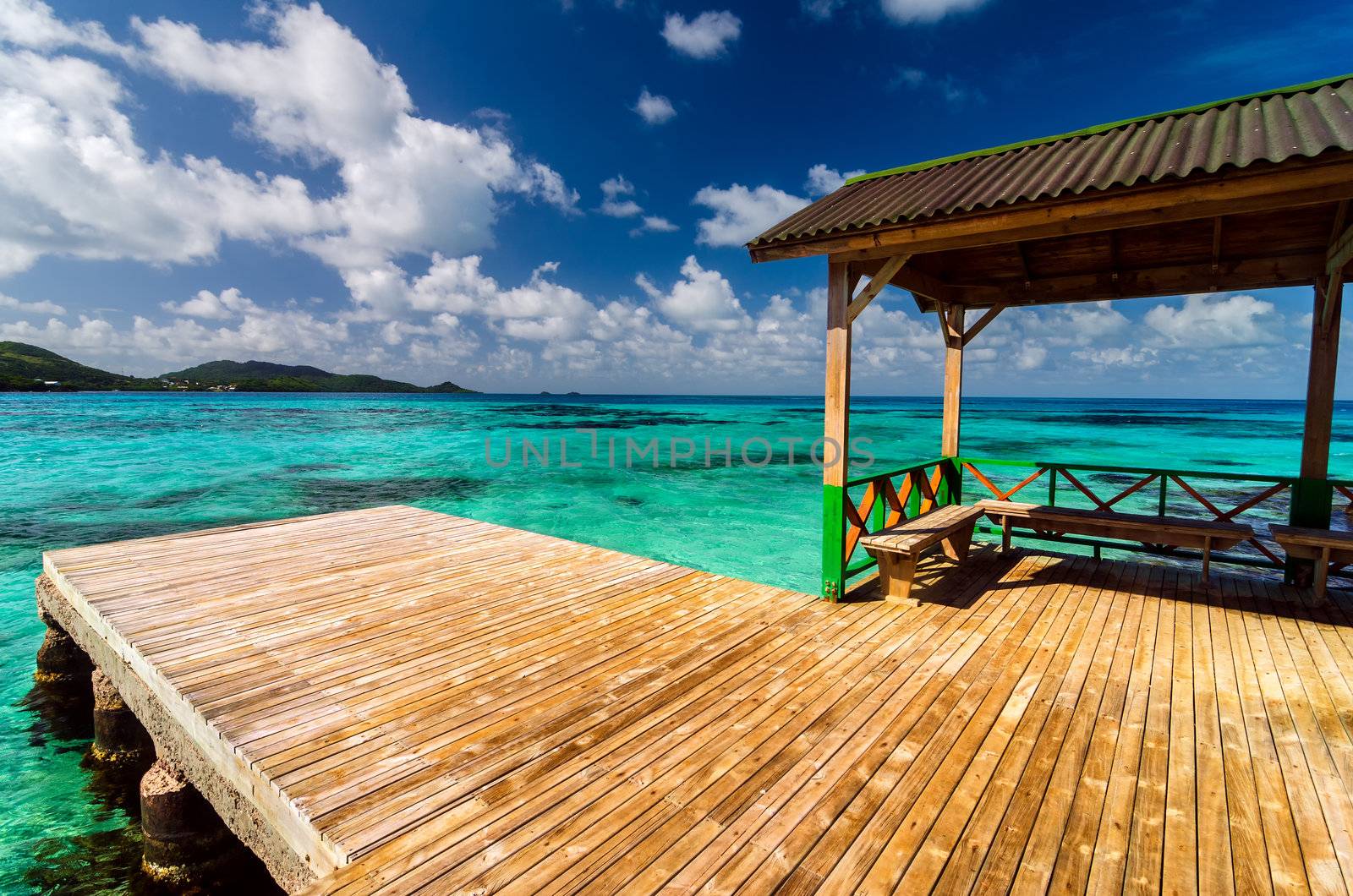 Wooden dock in beautiful blue and turquoise water in San Andres y Providencia, Colombia