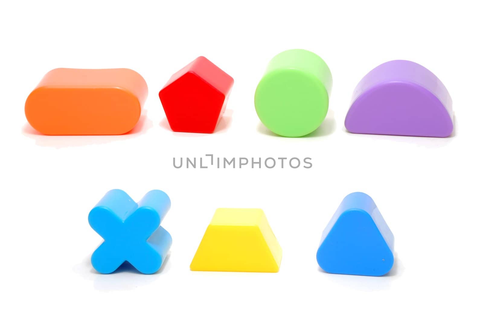 Random Plastic Geometric Figures Children Toys Isolated on White