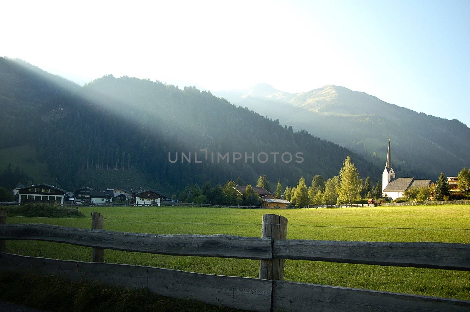 Sunbeam on an austrian church in the alps