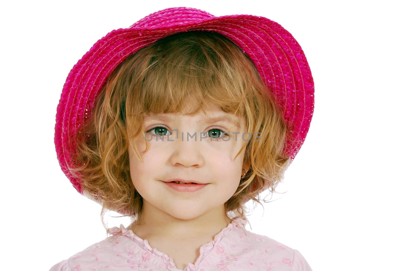 Little girl with red straw hat studio shot