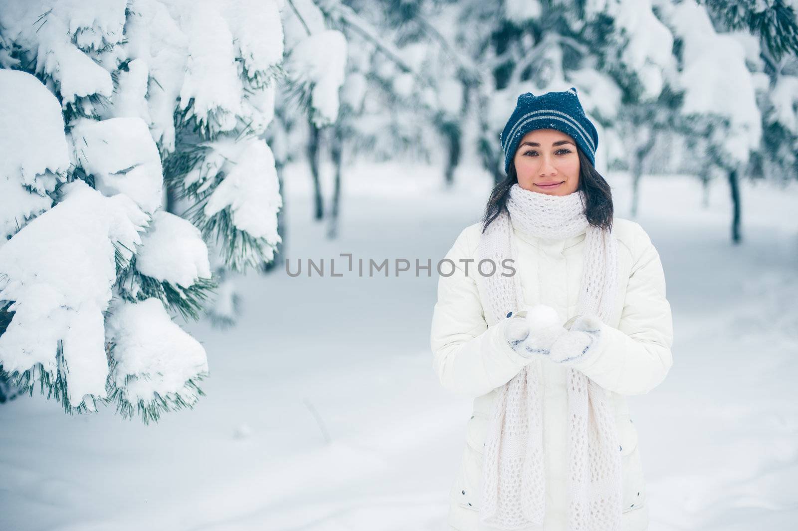 Portrait of beautiful young girl in winter day