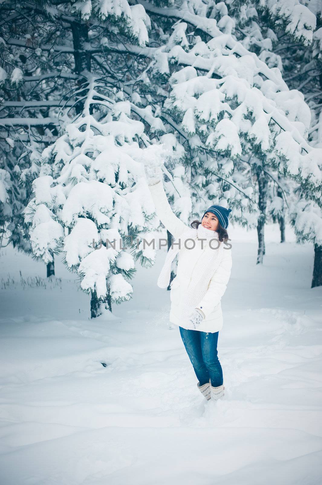 Portrait of beautiful young girl in winter day