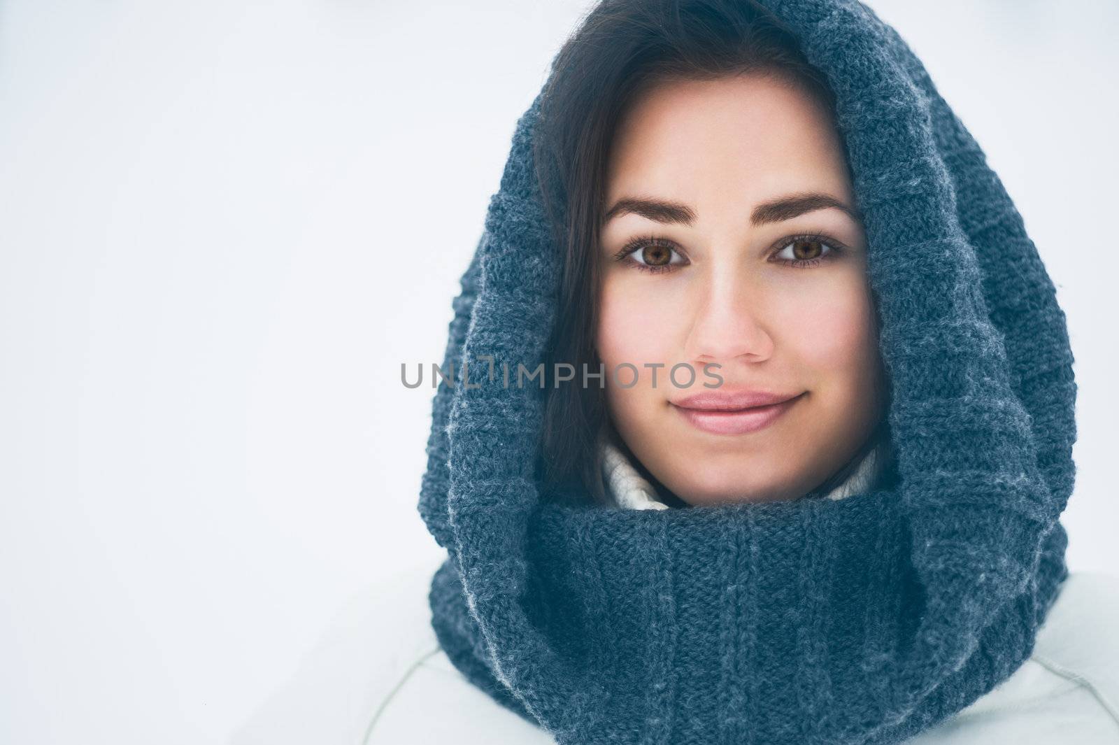 Portrait of beautiful young girl in winter day