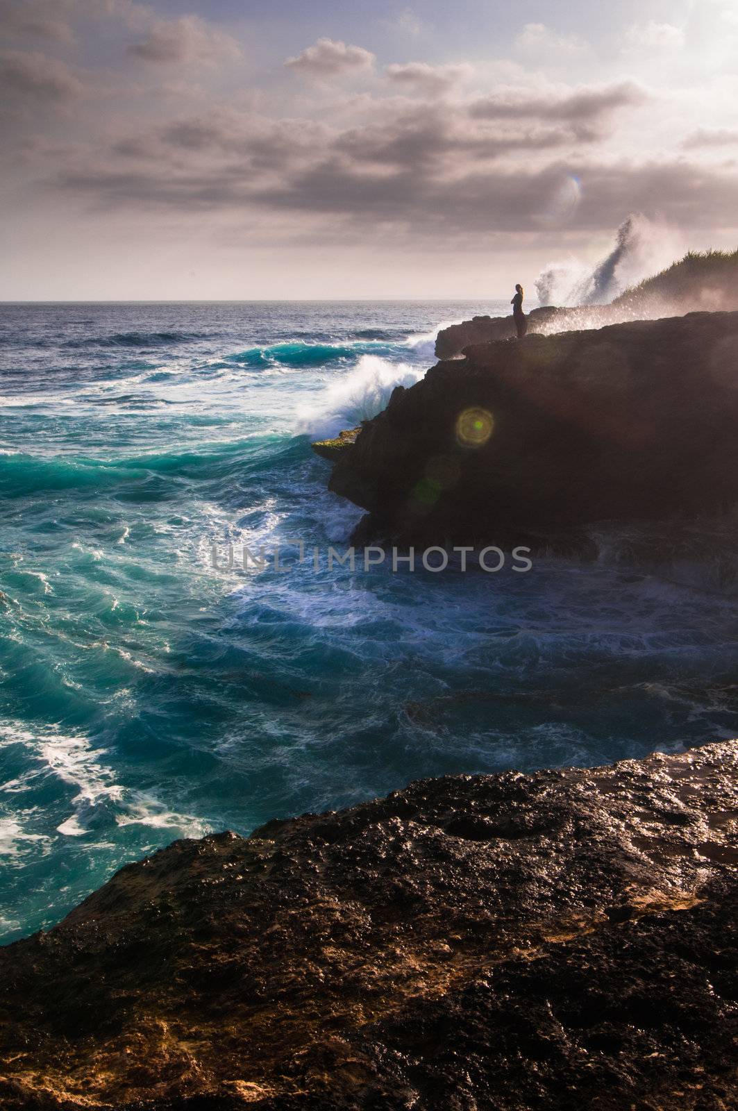 Sunset on Devil's tear - landmark of small island Nusa Lembongan, Indonesia