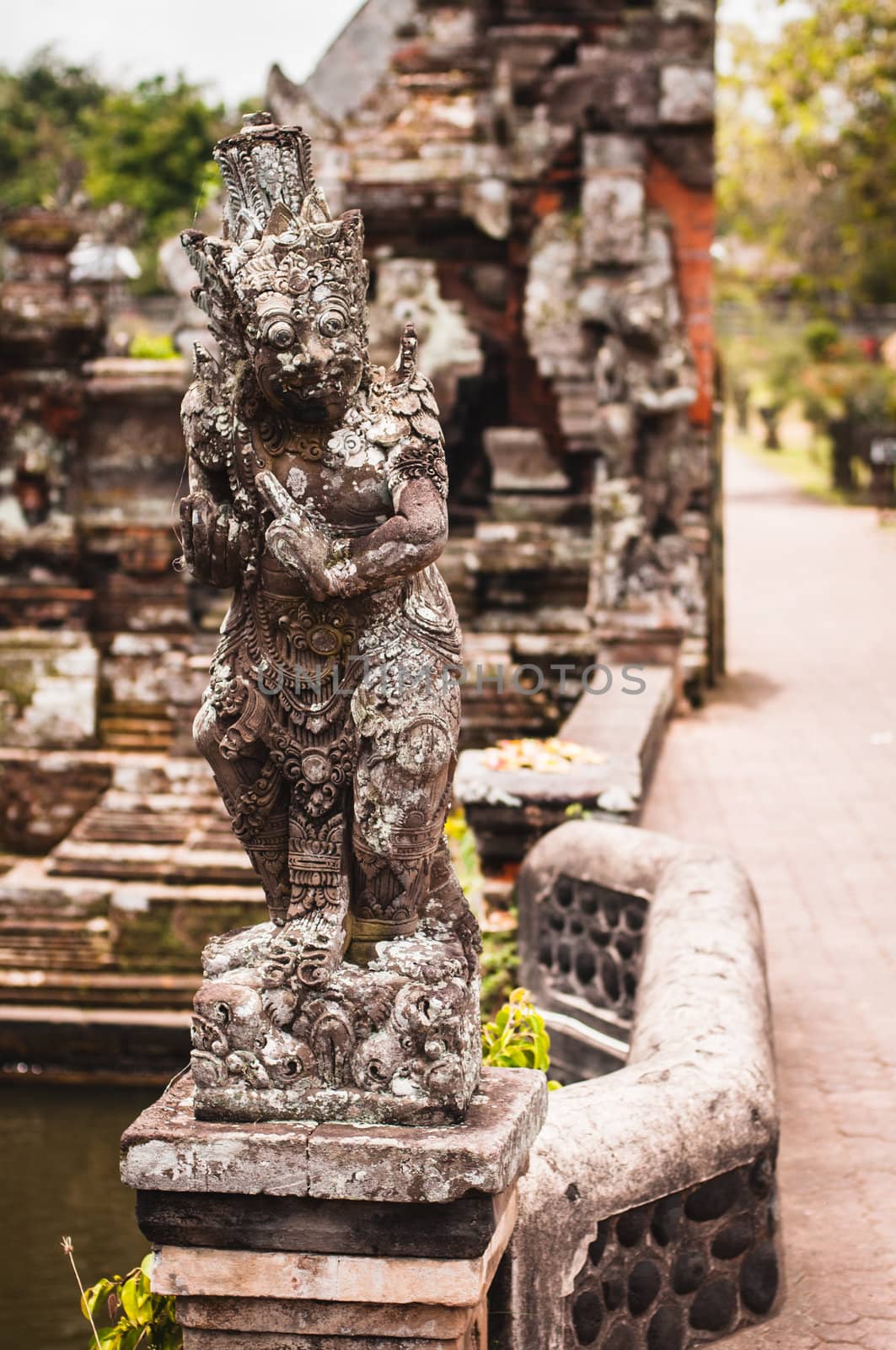 Statue in Pura Taman Ayun by nvelichko