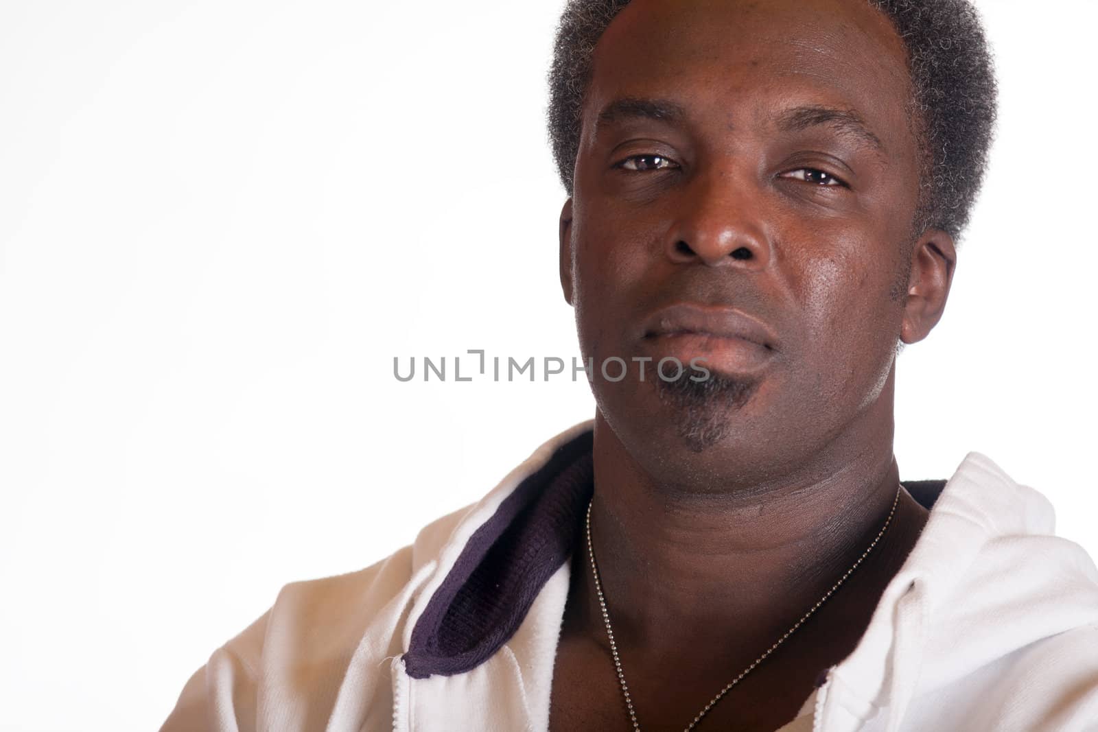 head shot portrait of american gangster in sweat suit