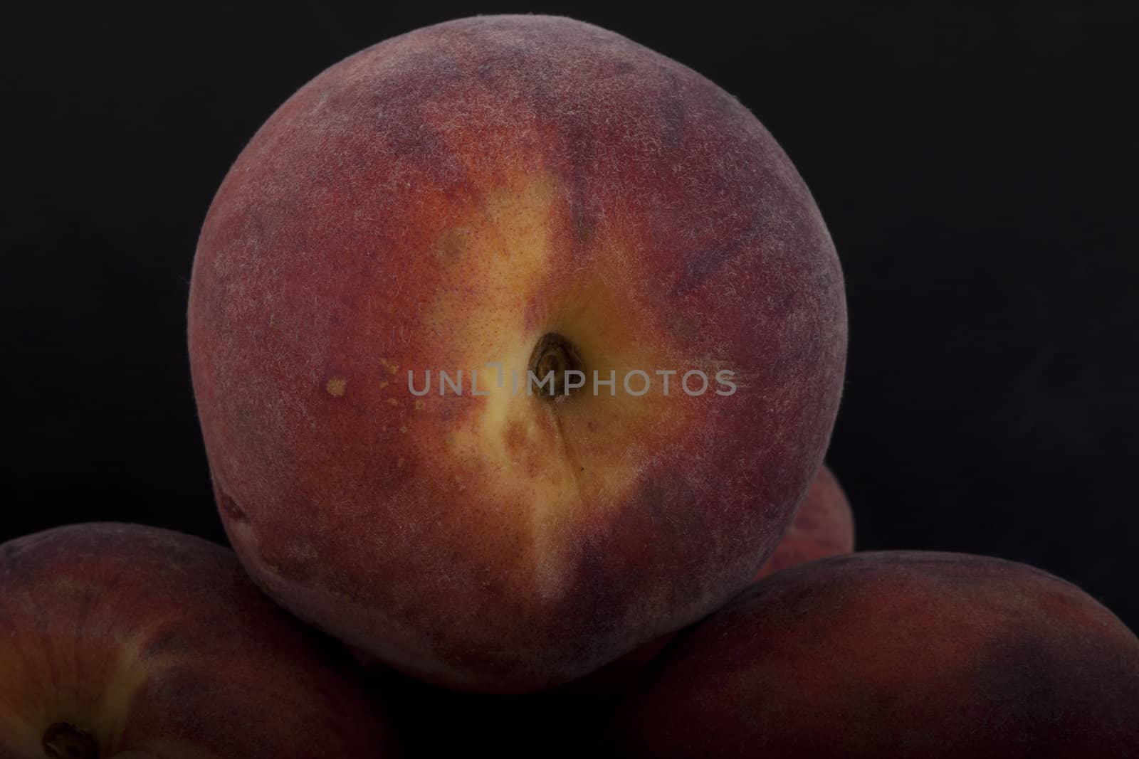 photo of peaches on a black background