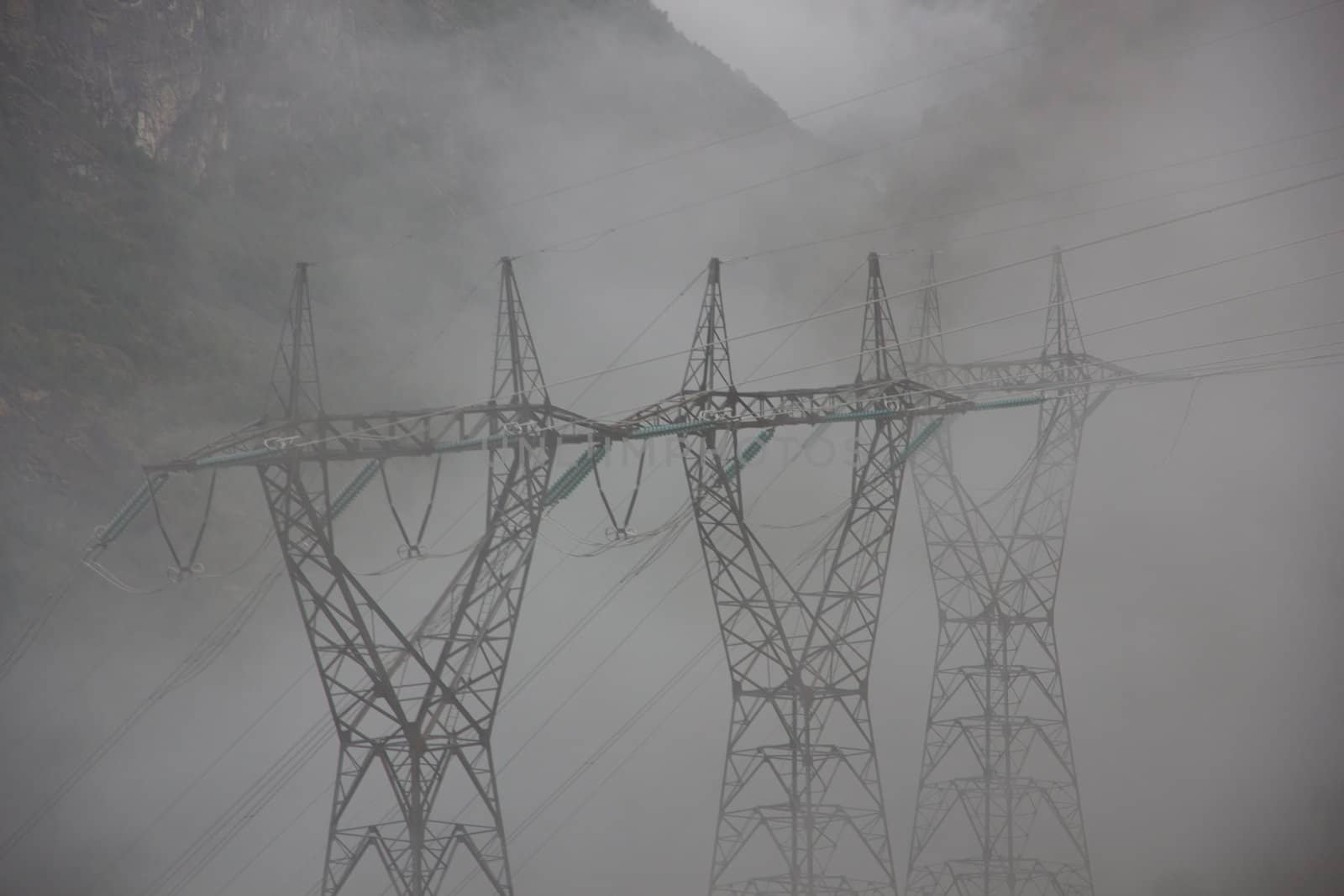 Picture of some powerlines in fog