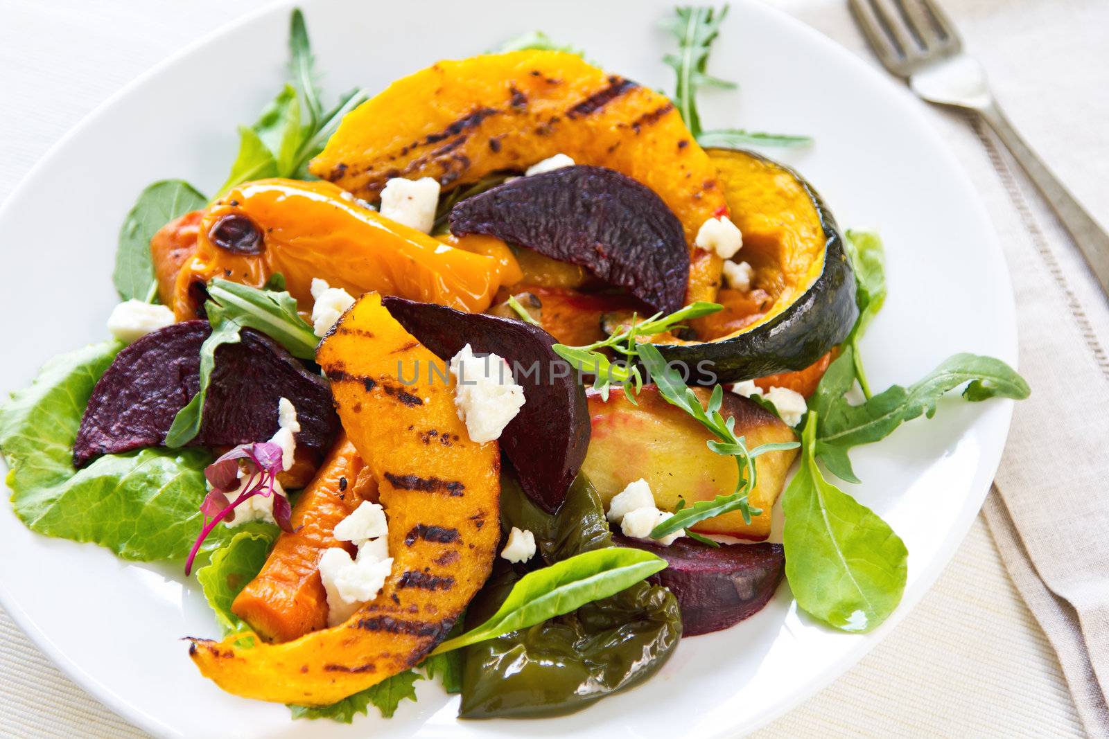 Grilled varieties of vegetables with Feta cheese  and rocket salad