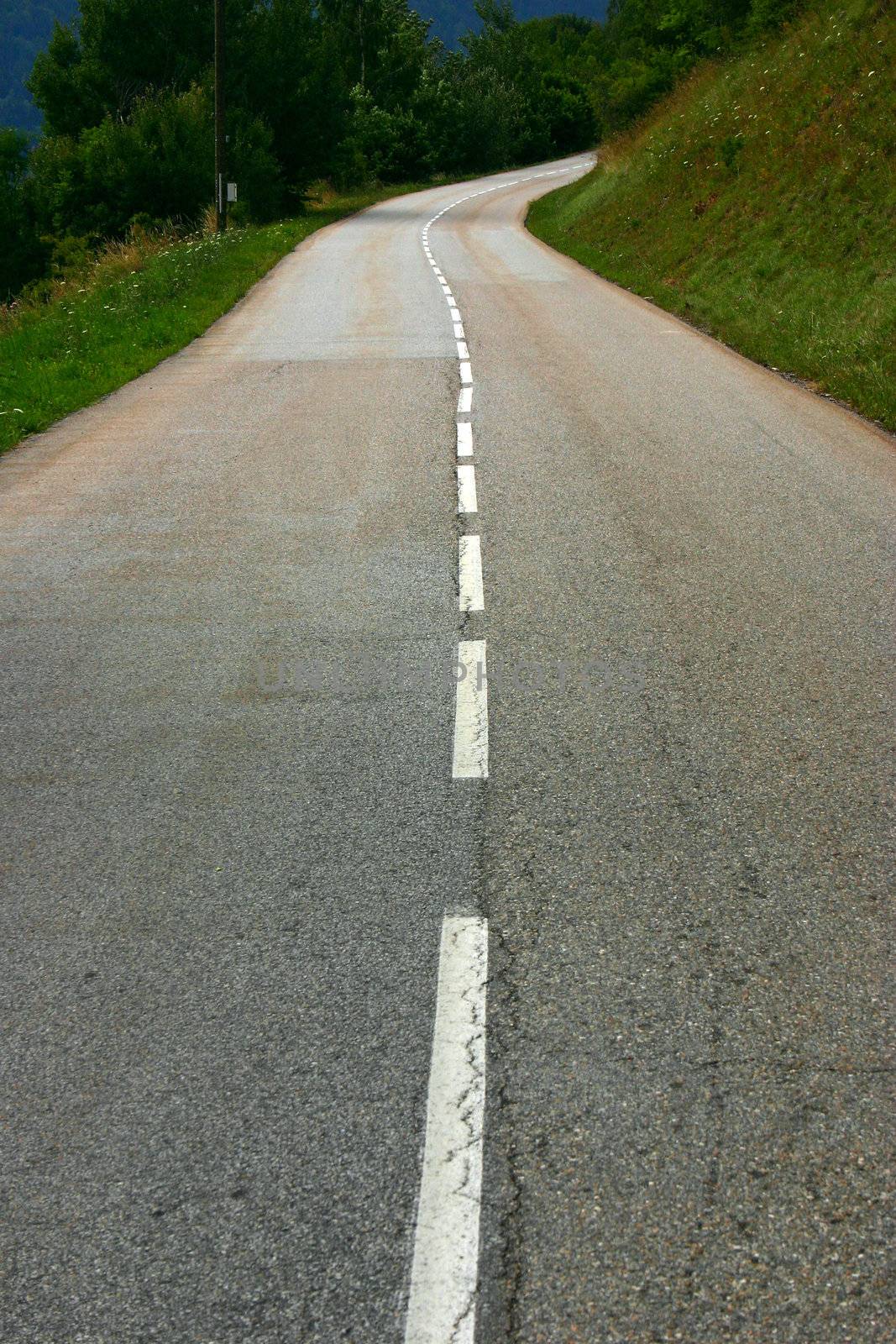 Long road travelling up in the mountains