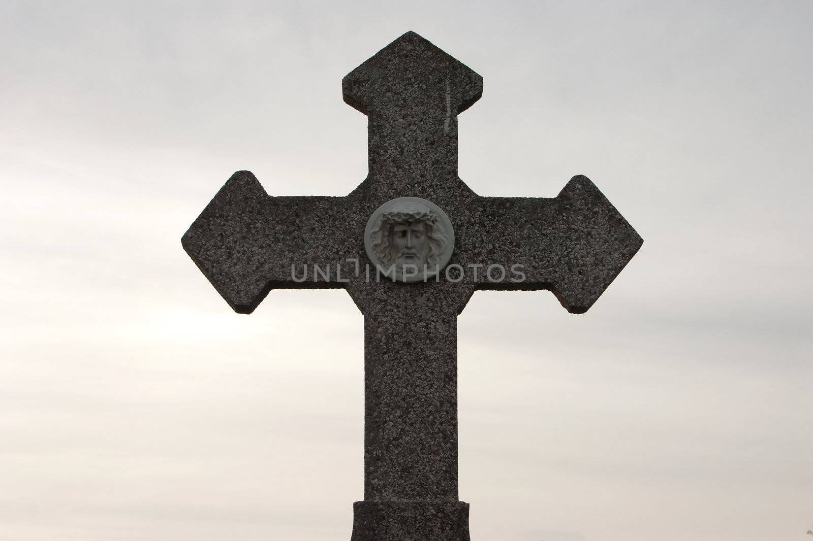 Cemetery Cross on a Graveyard with All Saints Day