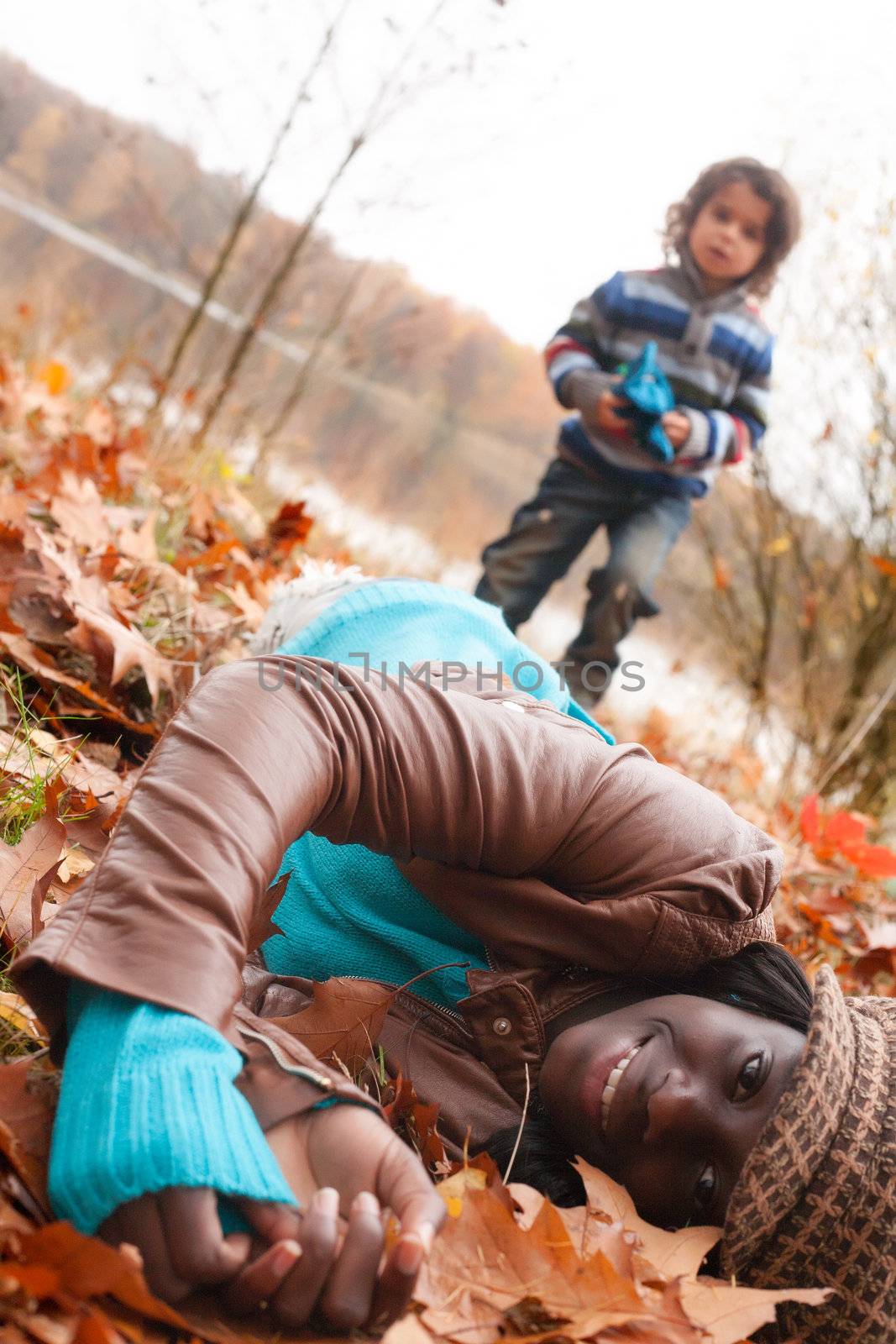 Happy foster children in the forest are having fun