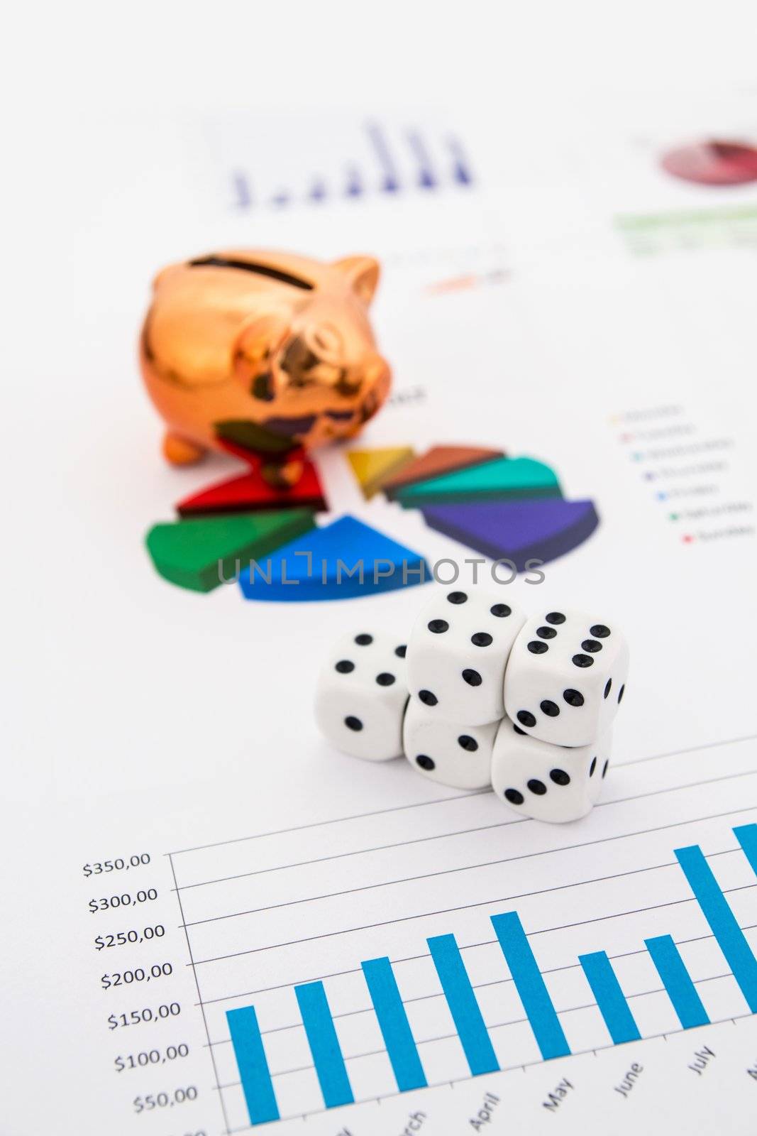 Saving money. Gambling concept.Pig, coins and dices composition