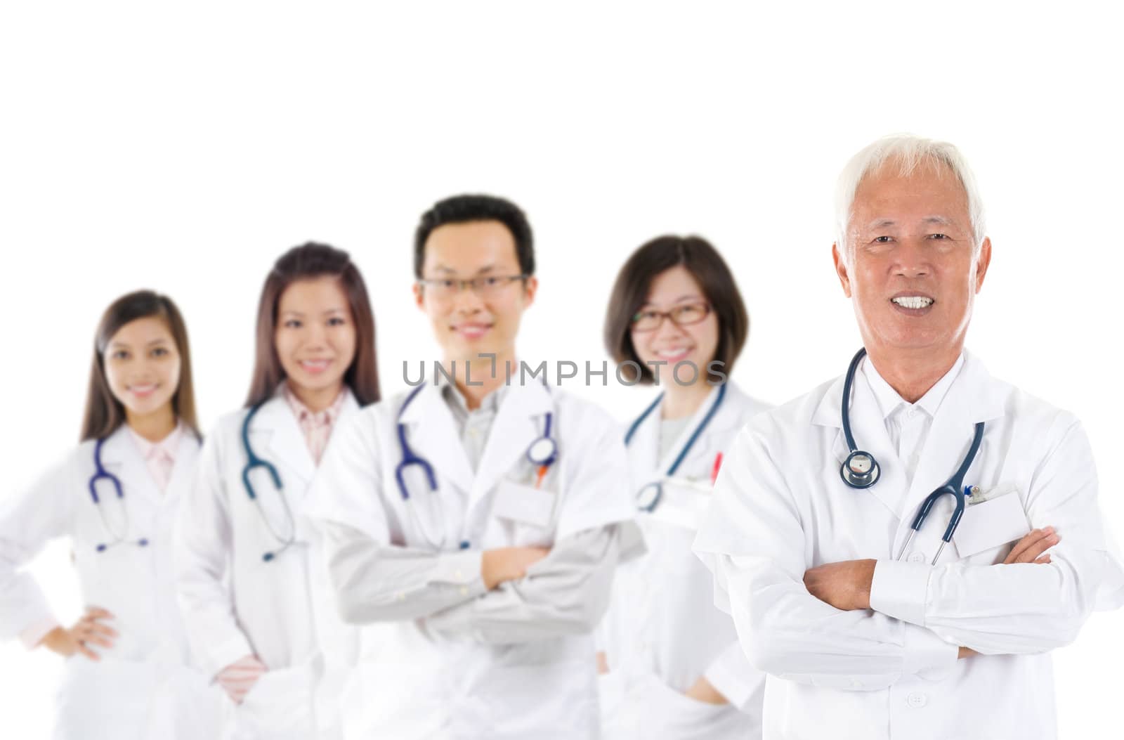 Asian medical team, expertise senior and mature doctors leading young practitioners, standing isolated white background