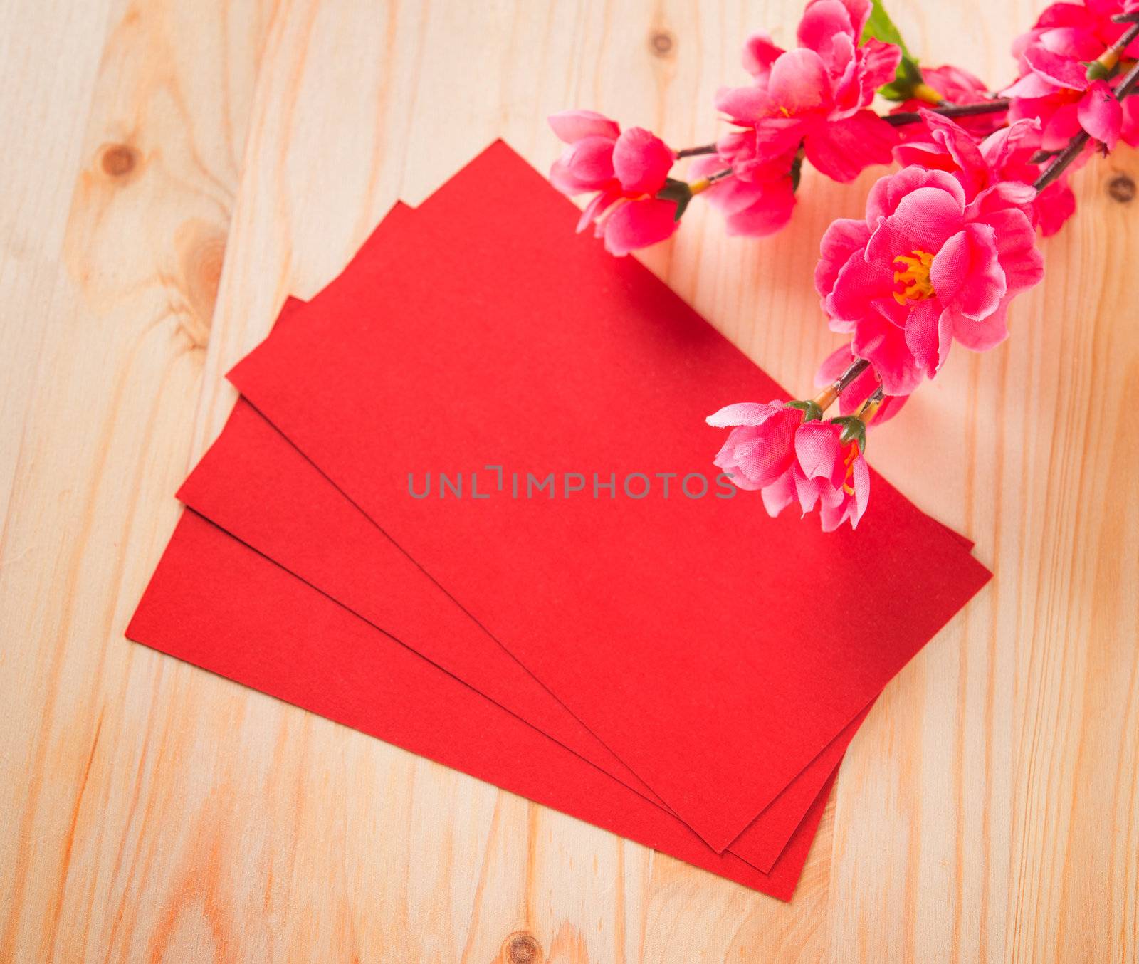 Chinese new year festival decorations, blank red packet or ang pow ready for text.