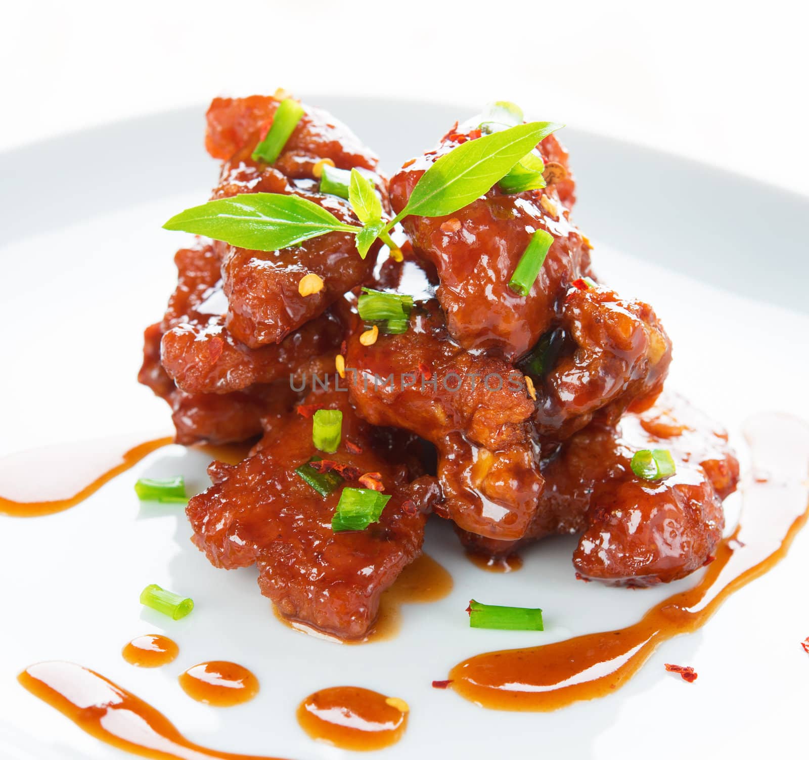 Spare ribs Chinese cuisine dish, close up delicious Asian food ready to serve in plate.