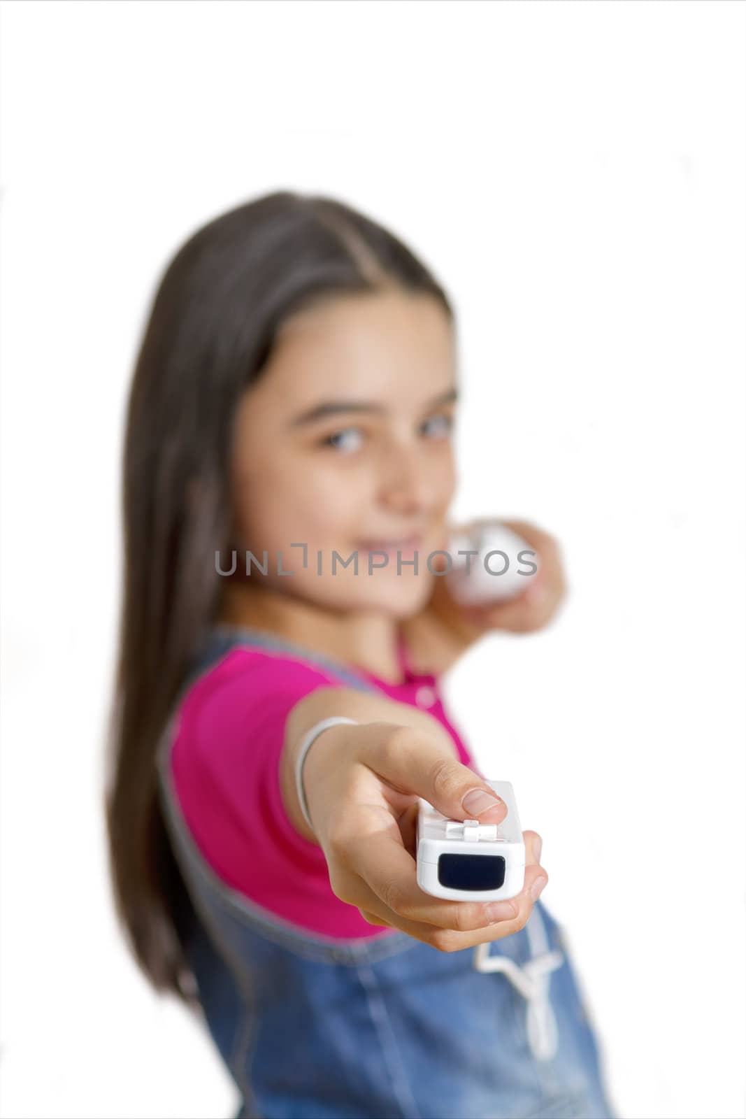 A teenage girl playing video game, isolated on white background