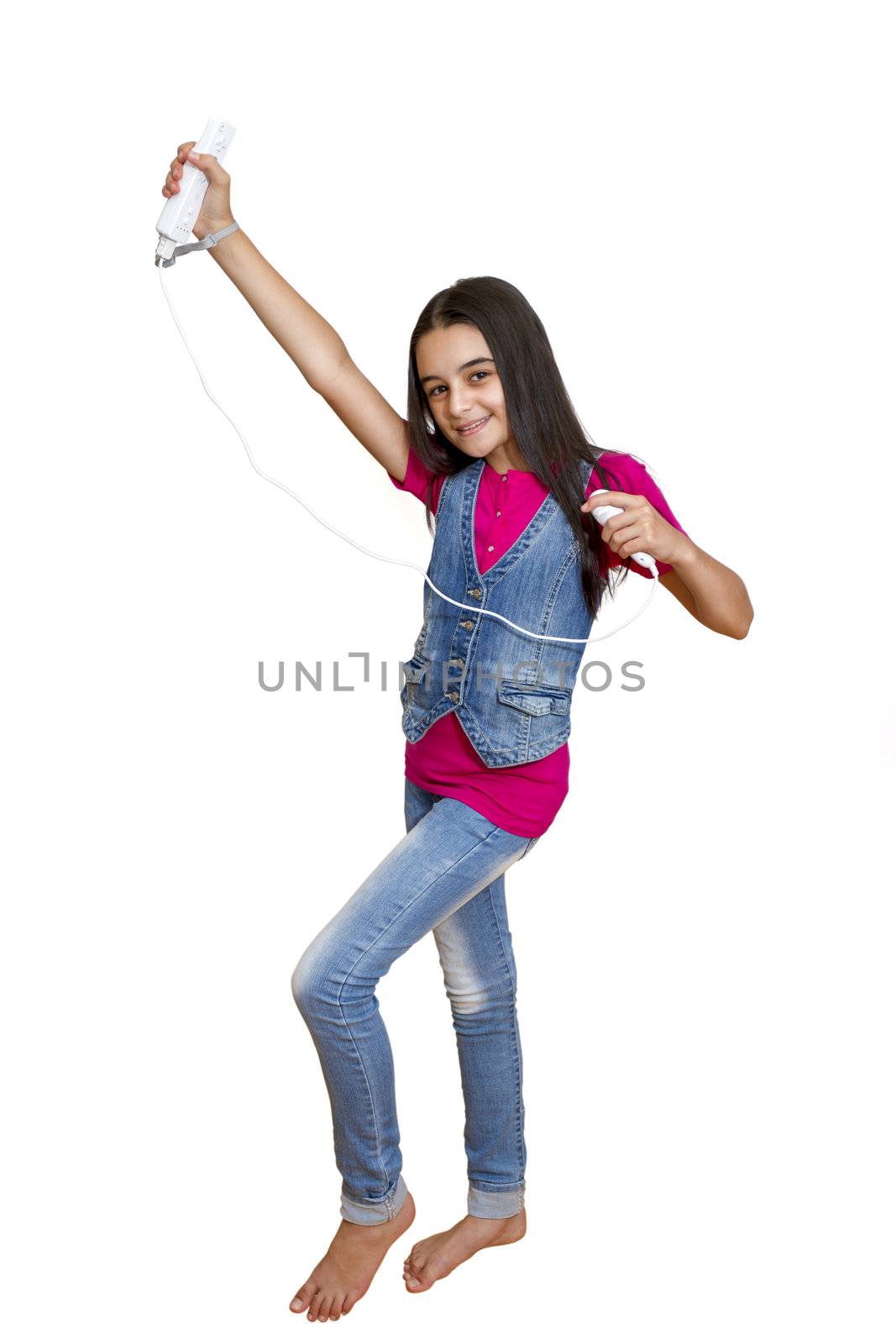 A teenage girl playing video game, isolated on white background