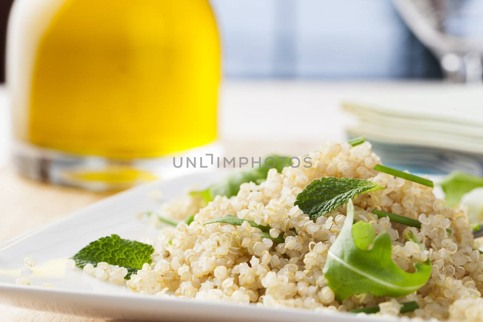 Fresh quinoa salad with herbs and arugula