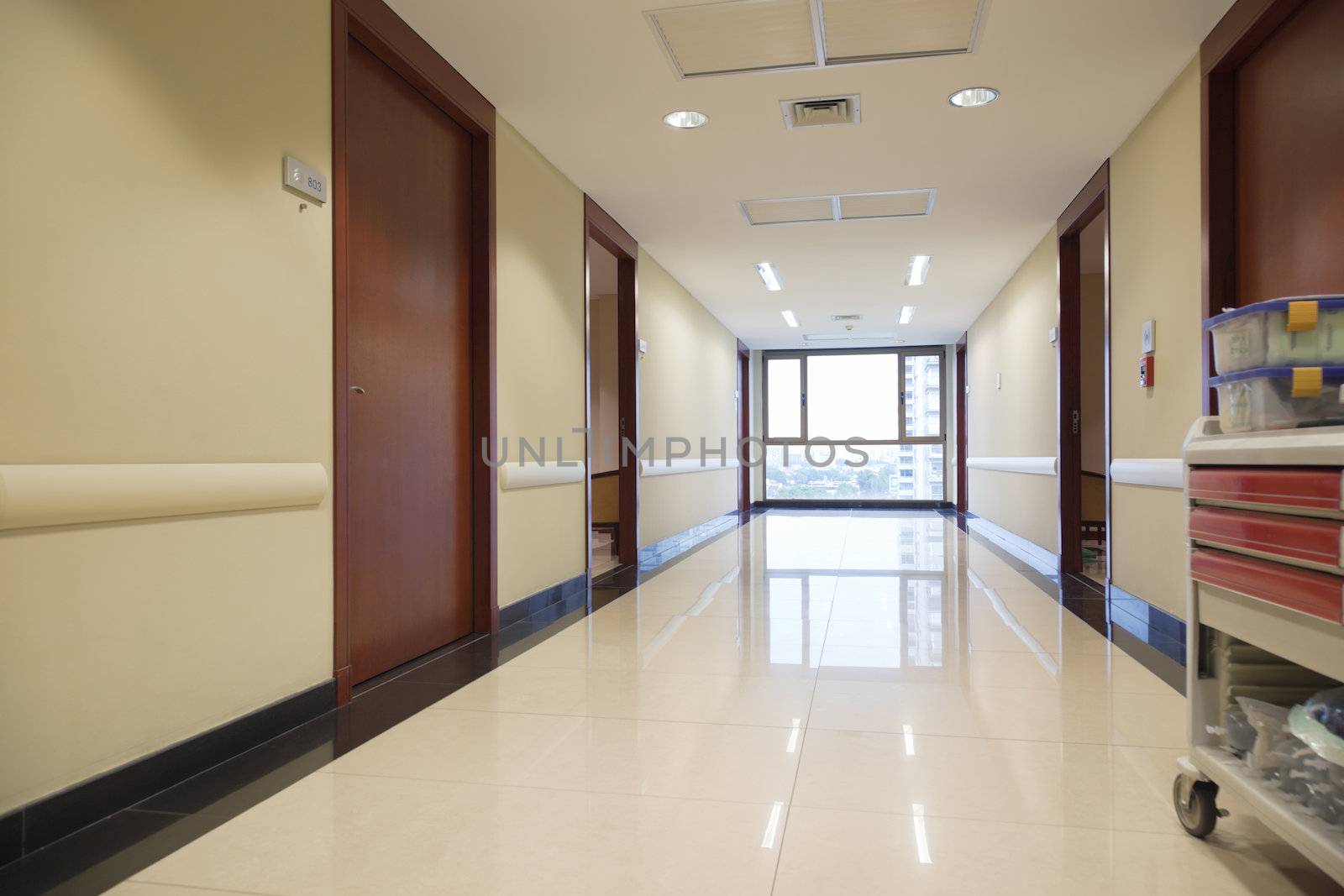 Clean reflective passageway of hospital with window
