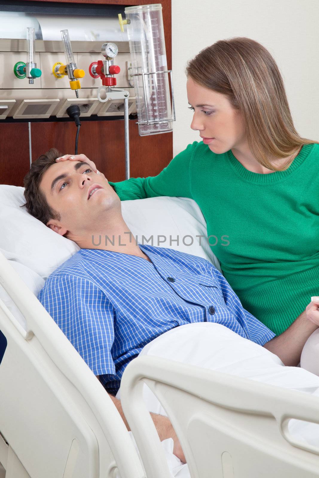 Sick patient with wife by leaf