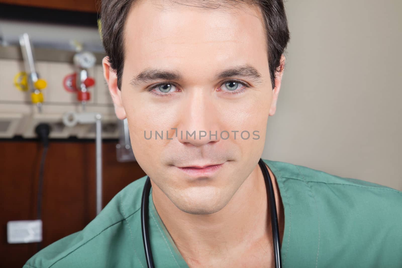 Portrait of confident male doctor in hospital