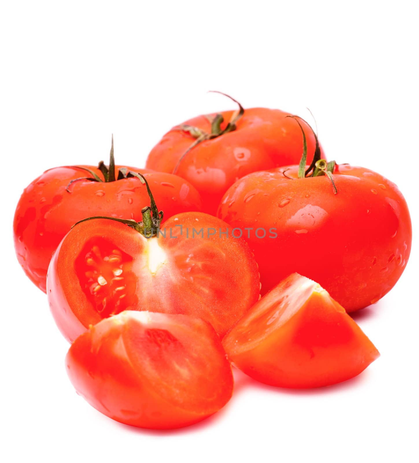 Closeup view of tomatoes isolated on the white background