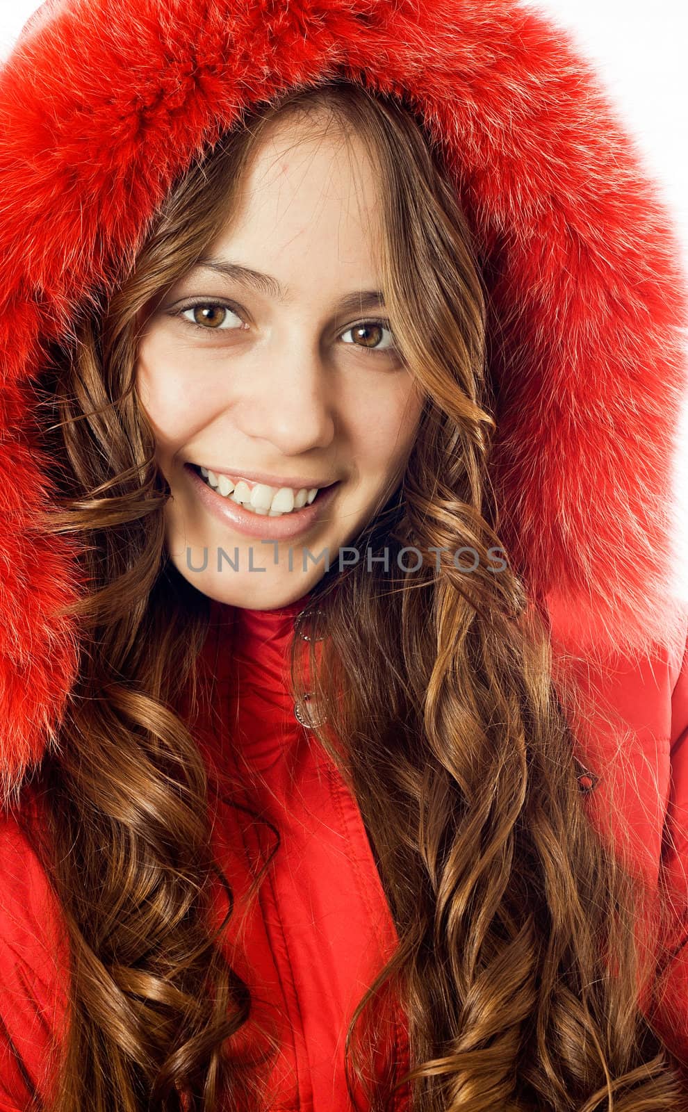 Portrait of a beautiful, smiling girl dress red fur coat
