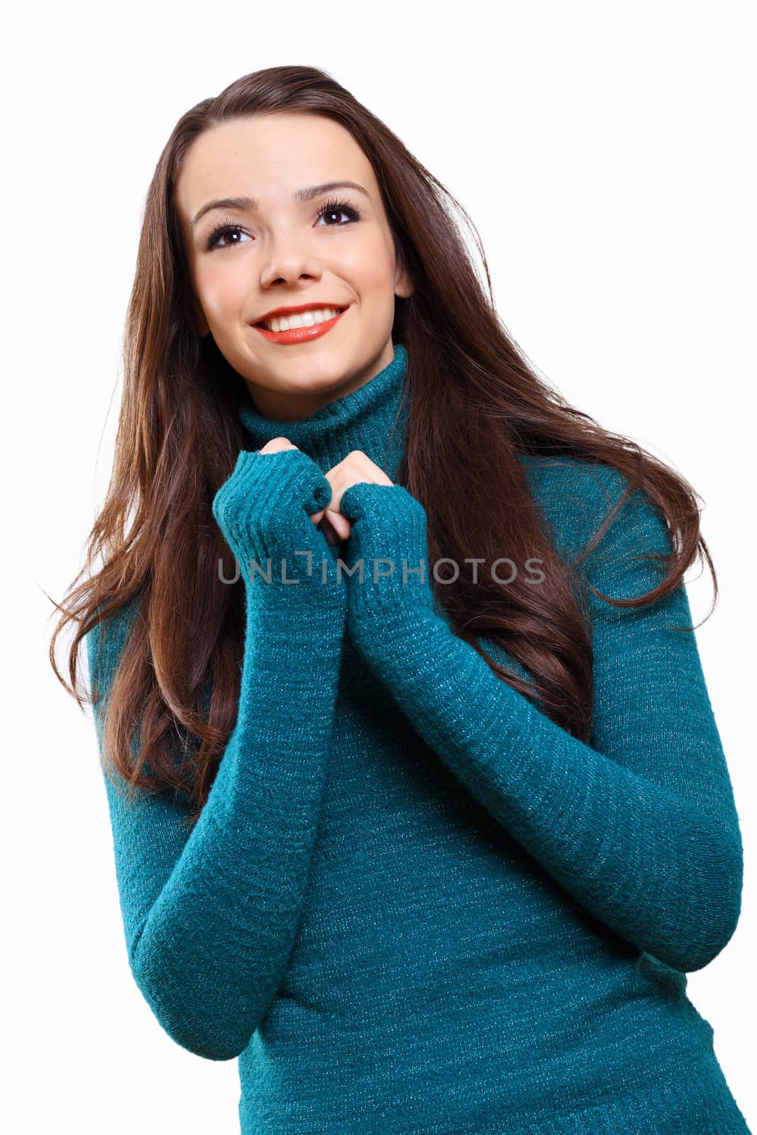 Young pretty woman with long hair wearing warm pullover