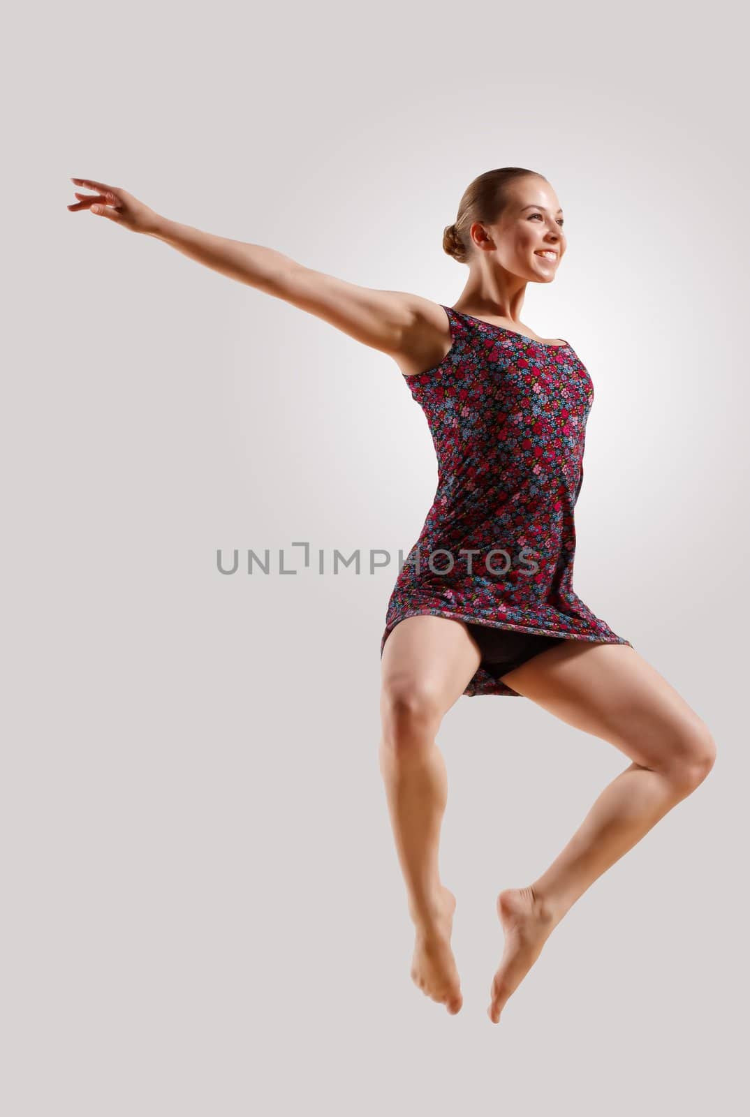 Girl in color dress dancing by sergey_nivens