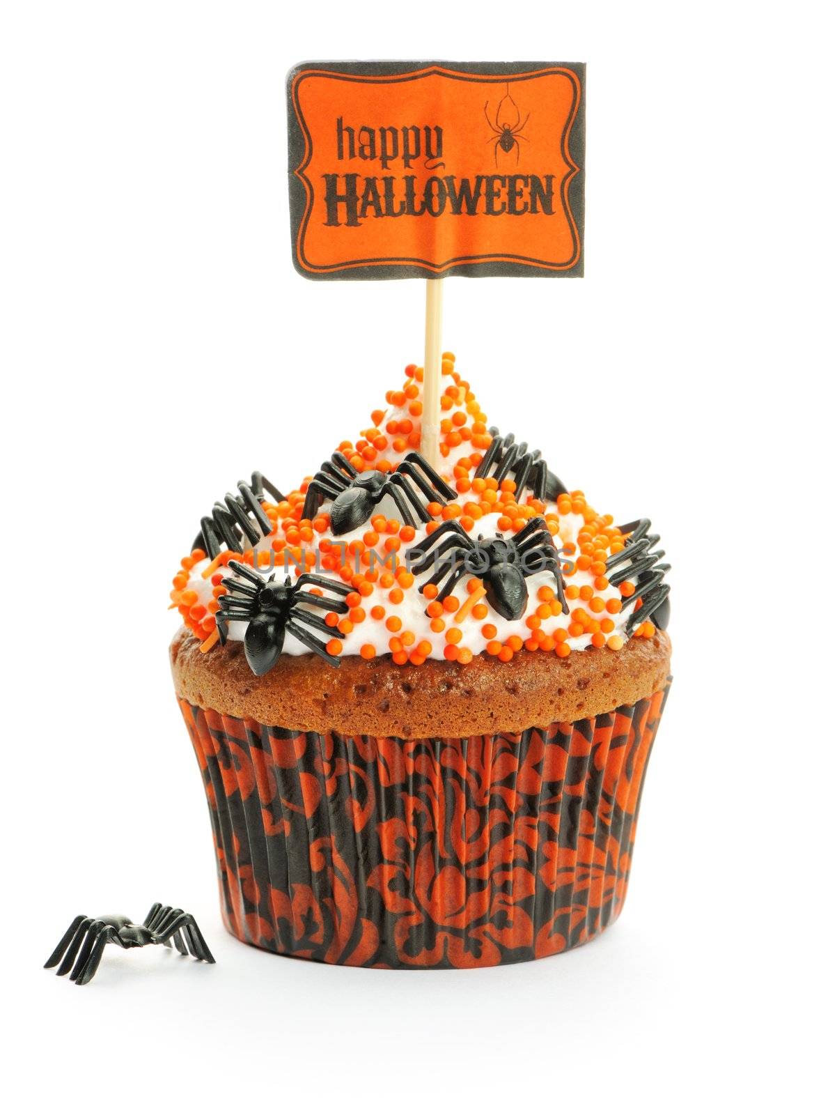 Halloween cupcake with decoration isolated on white