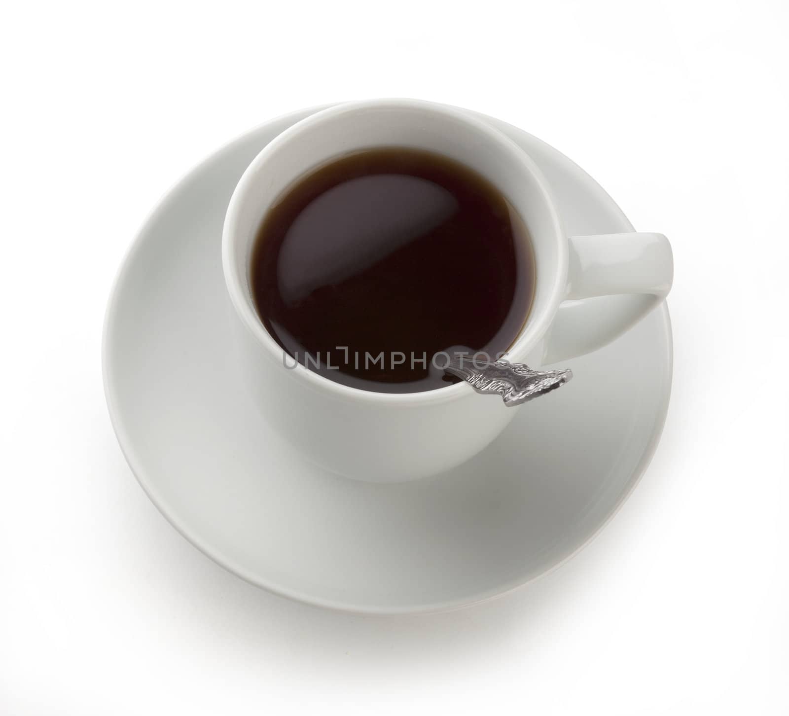 Isolated white cup of tea on the saucer