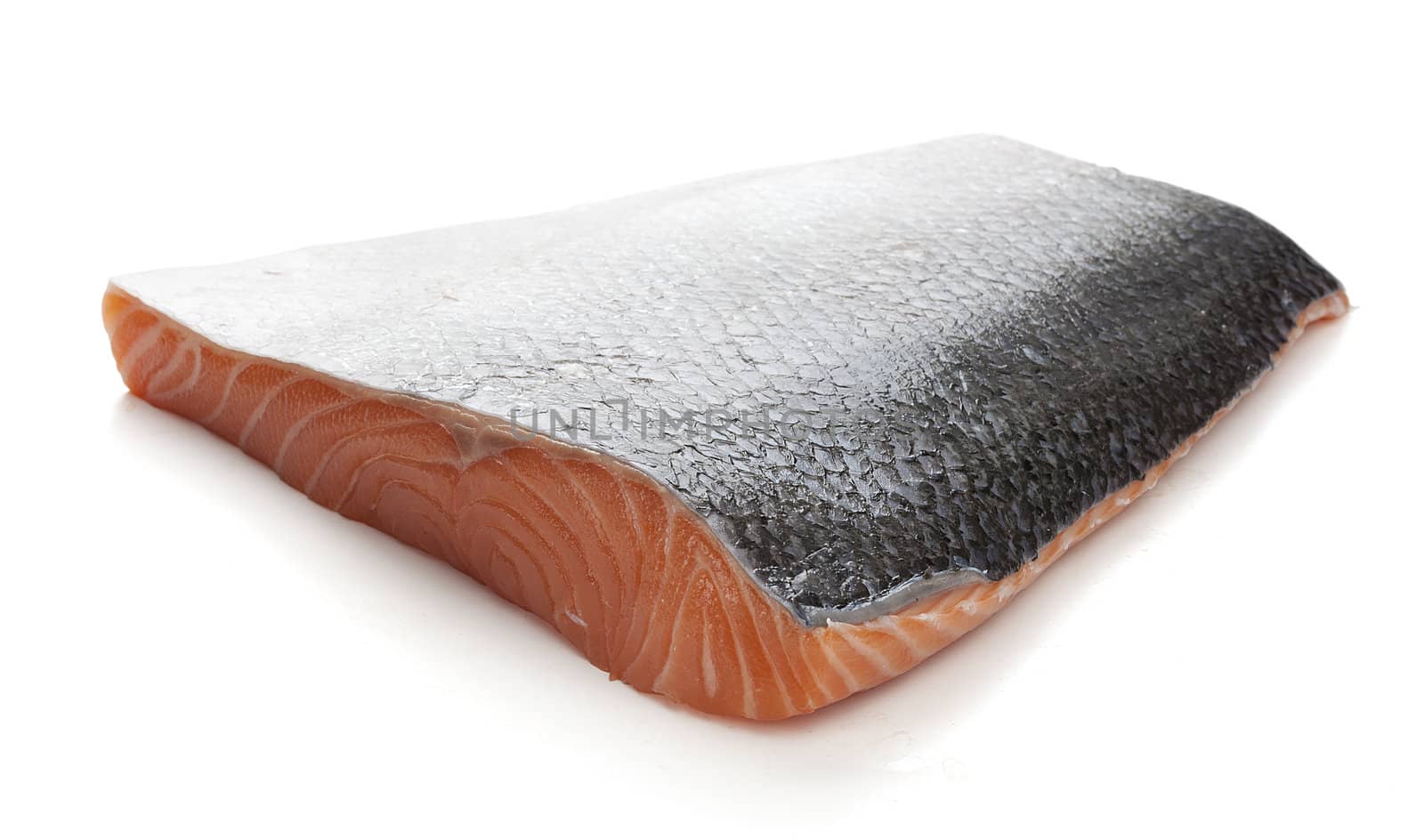 Chunk of raw salmon on the white background