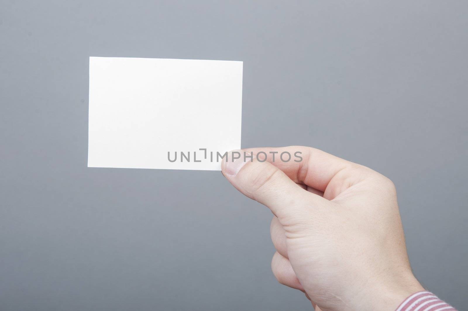 An image of businessmen holding blank card