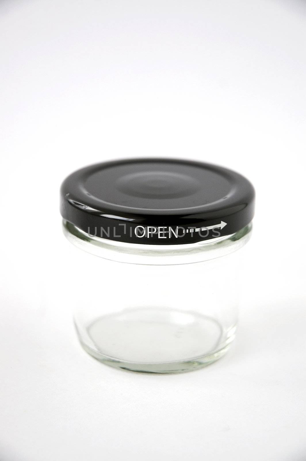 empty glass jar with text open isolated